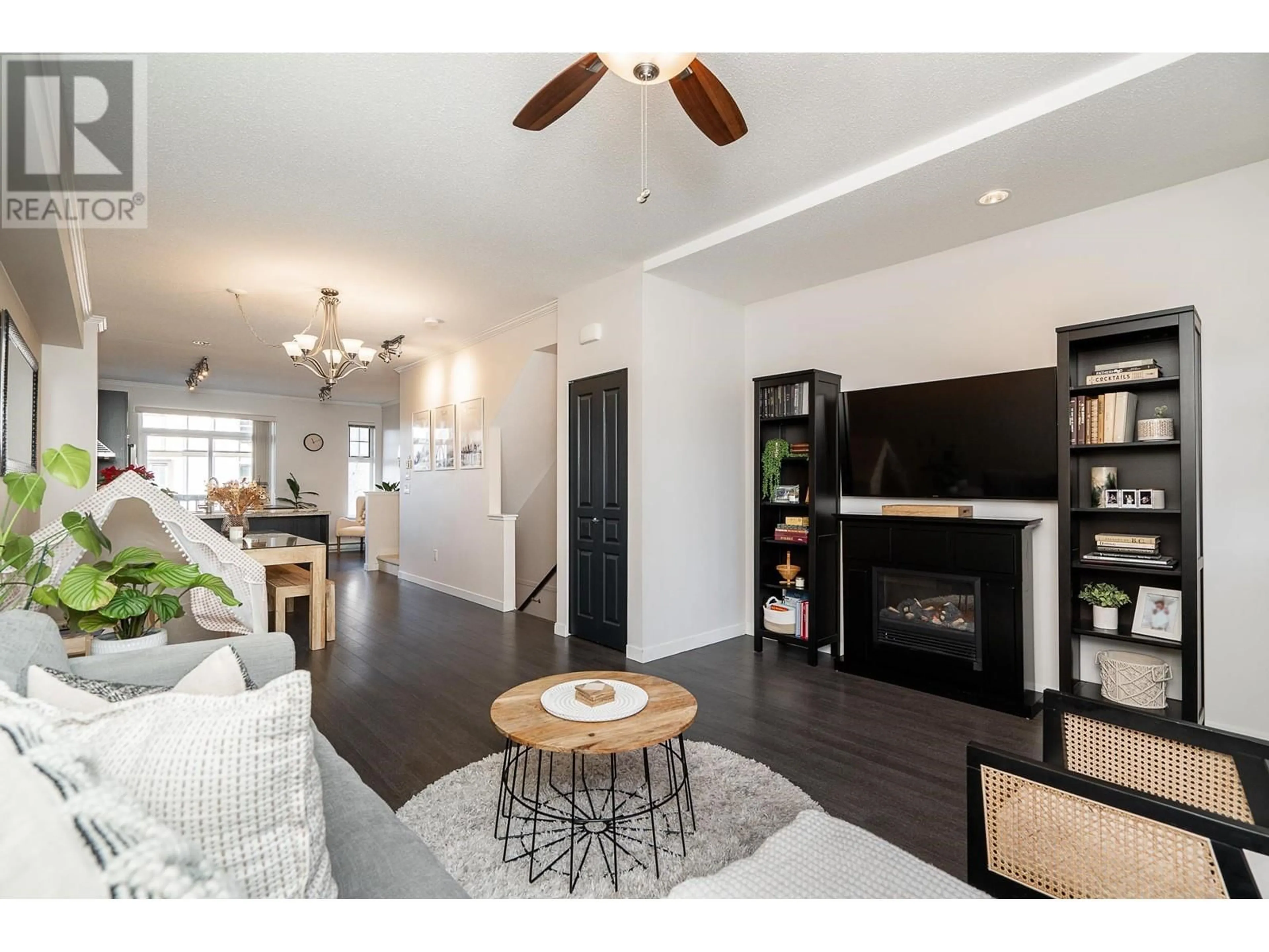 Living room with furniture, wood/laminate floor for 76 1338 HAMES CRESCENT, Coquitlam British Columbia V3E0J2