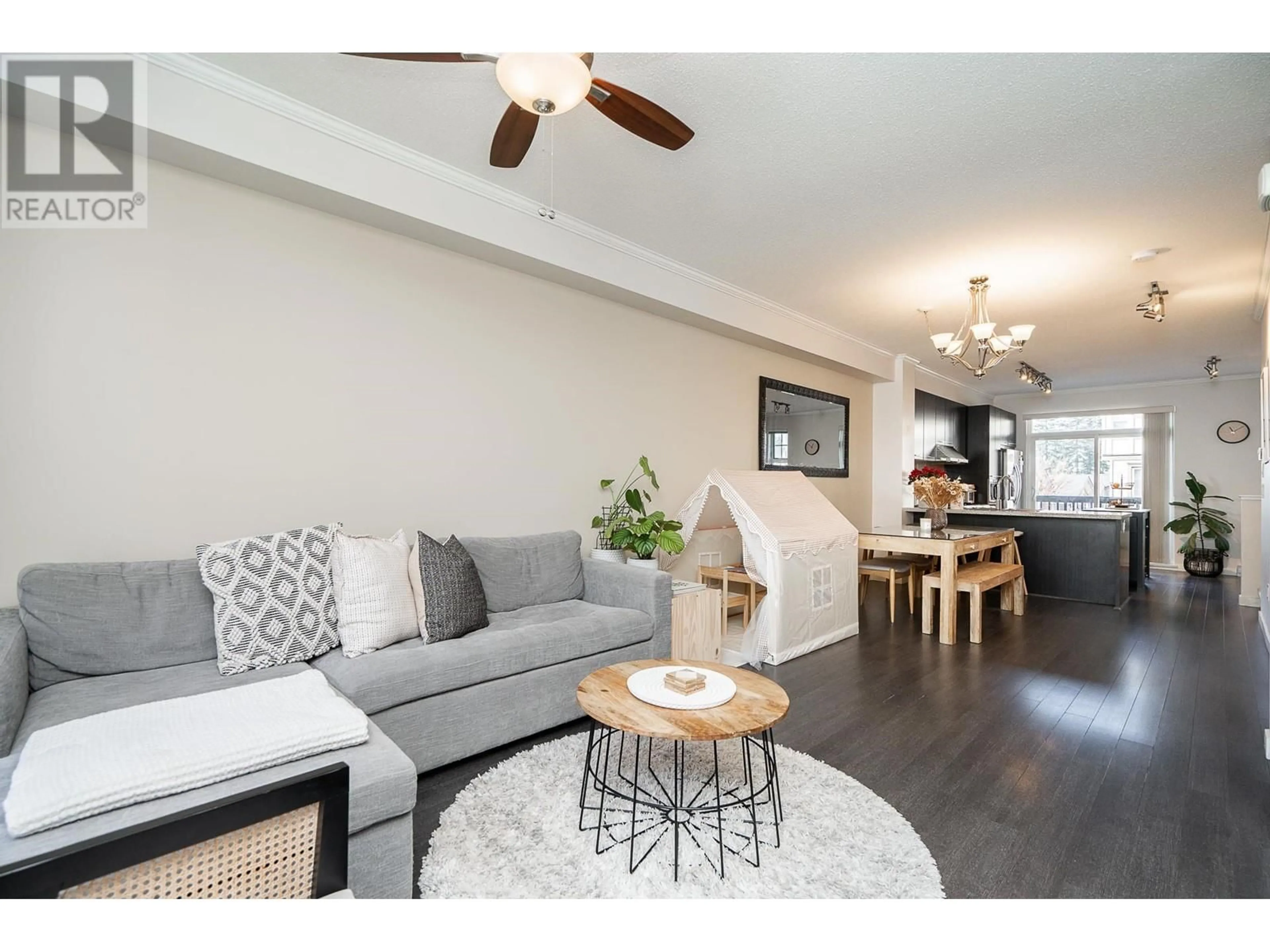 Living room with furniture, wood/laminate floor for 76 1338 HAMES CRESCENT, Coquitlam British Columbia V3E0J2