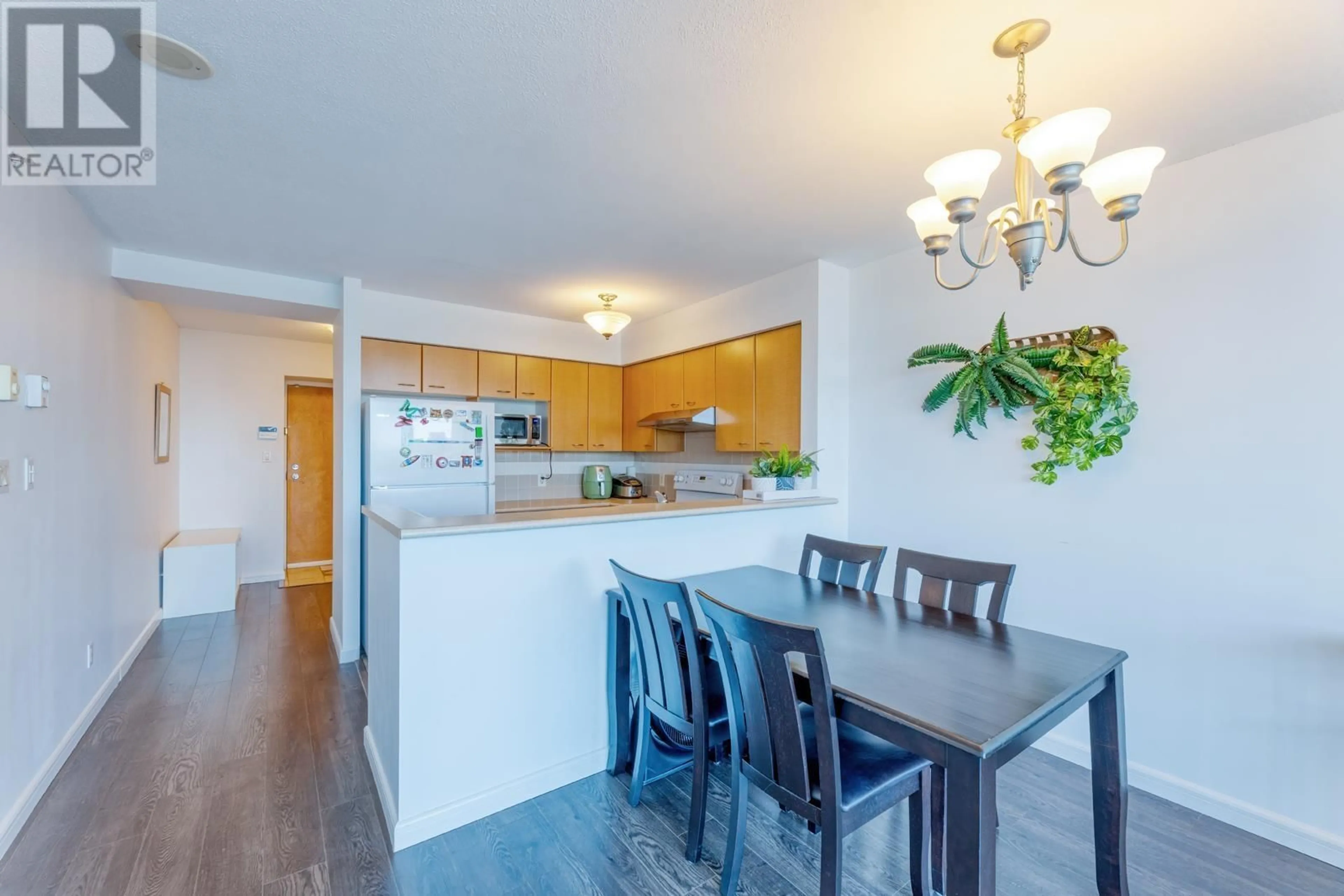 Open concept kitchen, wood/laminate floor for 2103 - 6088 WILLINGDON AVENUE, Burnaby British Columbia V5H4V2