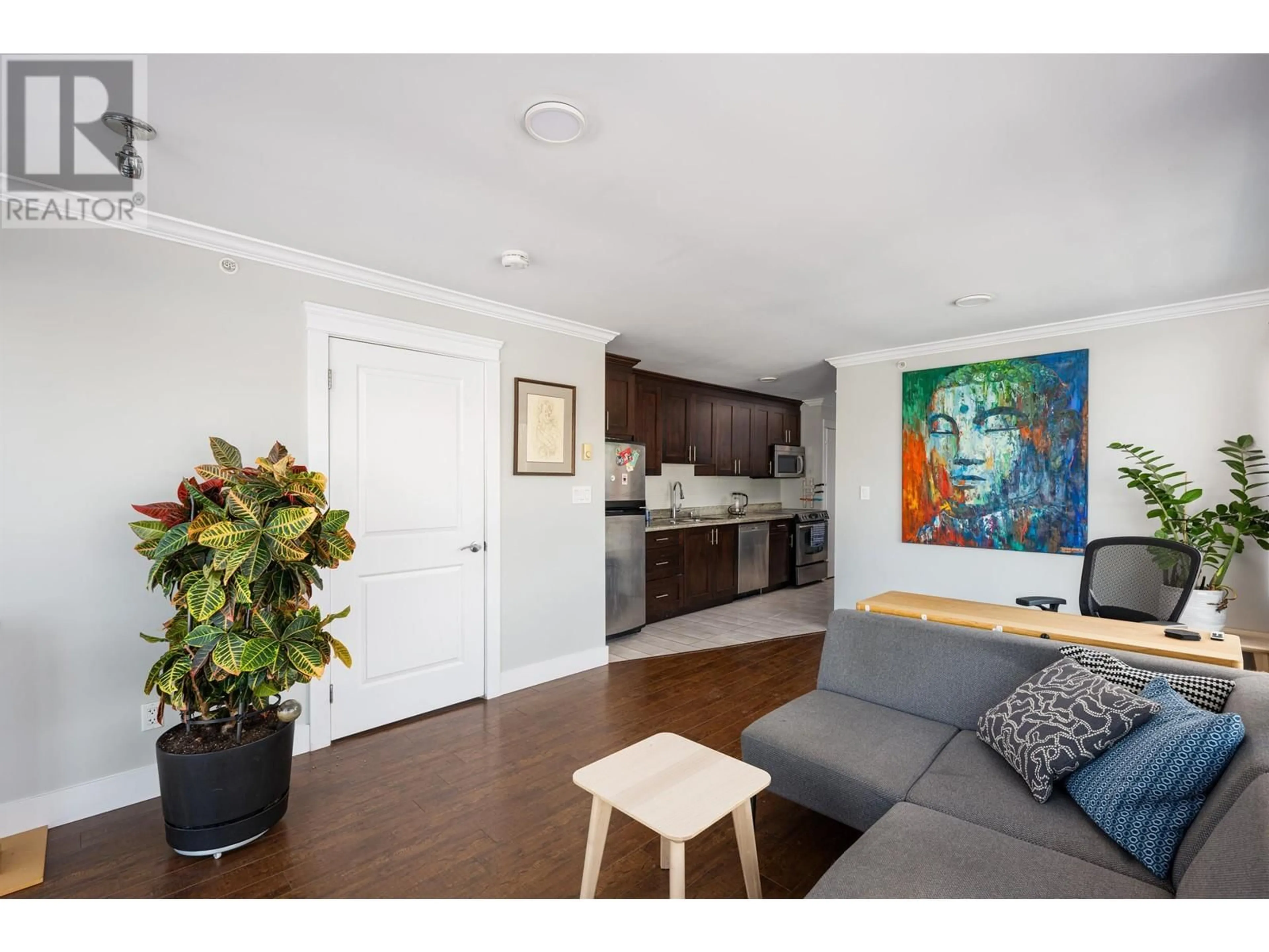 Living room with furniture, wood/laminate floor for 303 2009 E HASTINGS STREET, Vancouver British Columbia V5L1T9