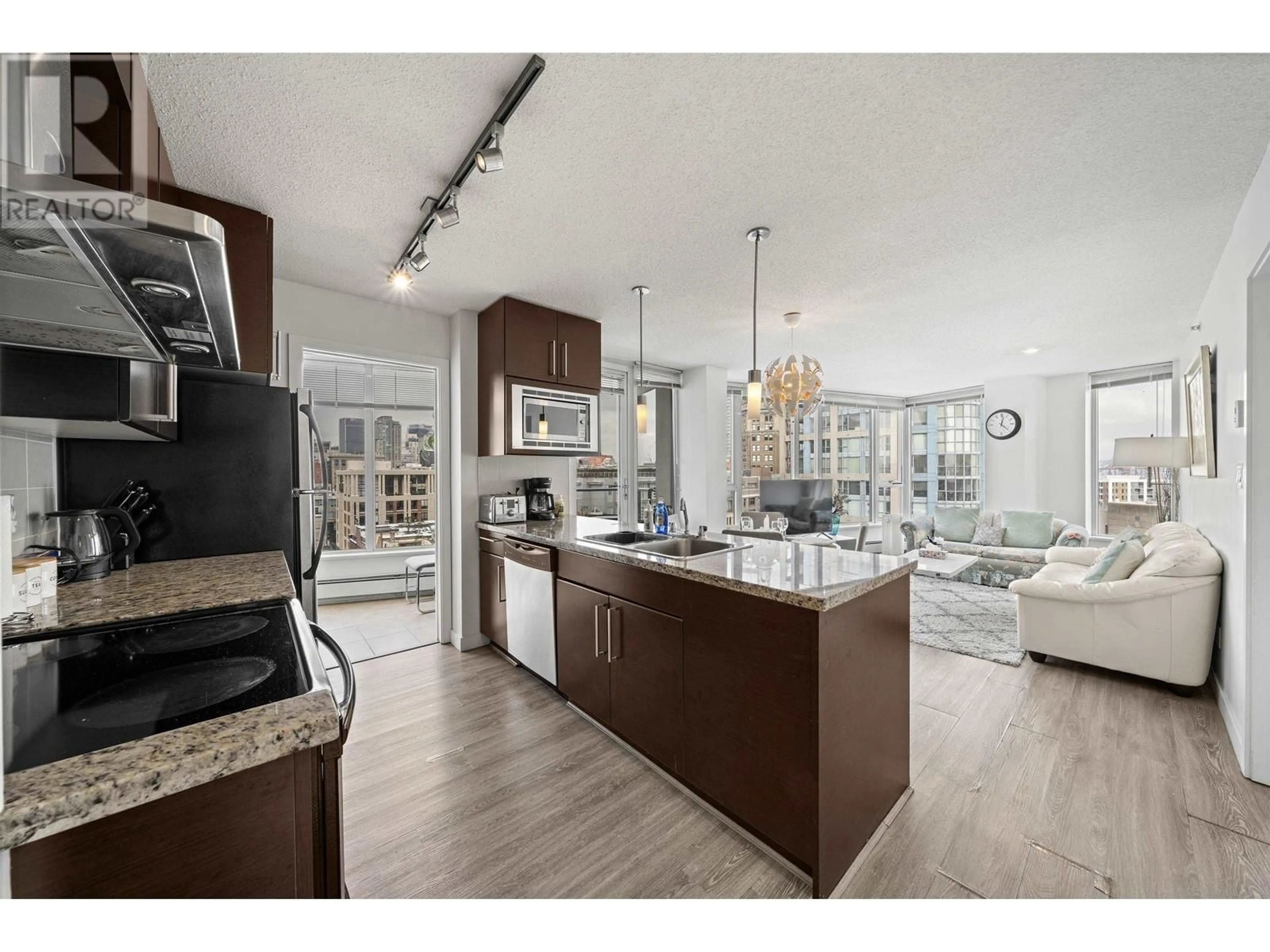 Open concept kitchen, ceramic/tile floor for 1703 - 188 KEEFER PLACE, Vancouver British Columbia V6B0J1
