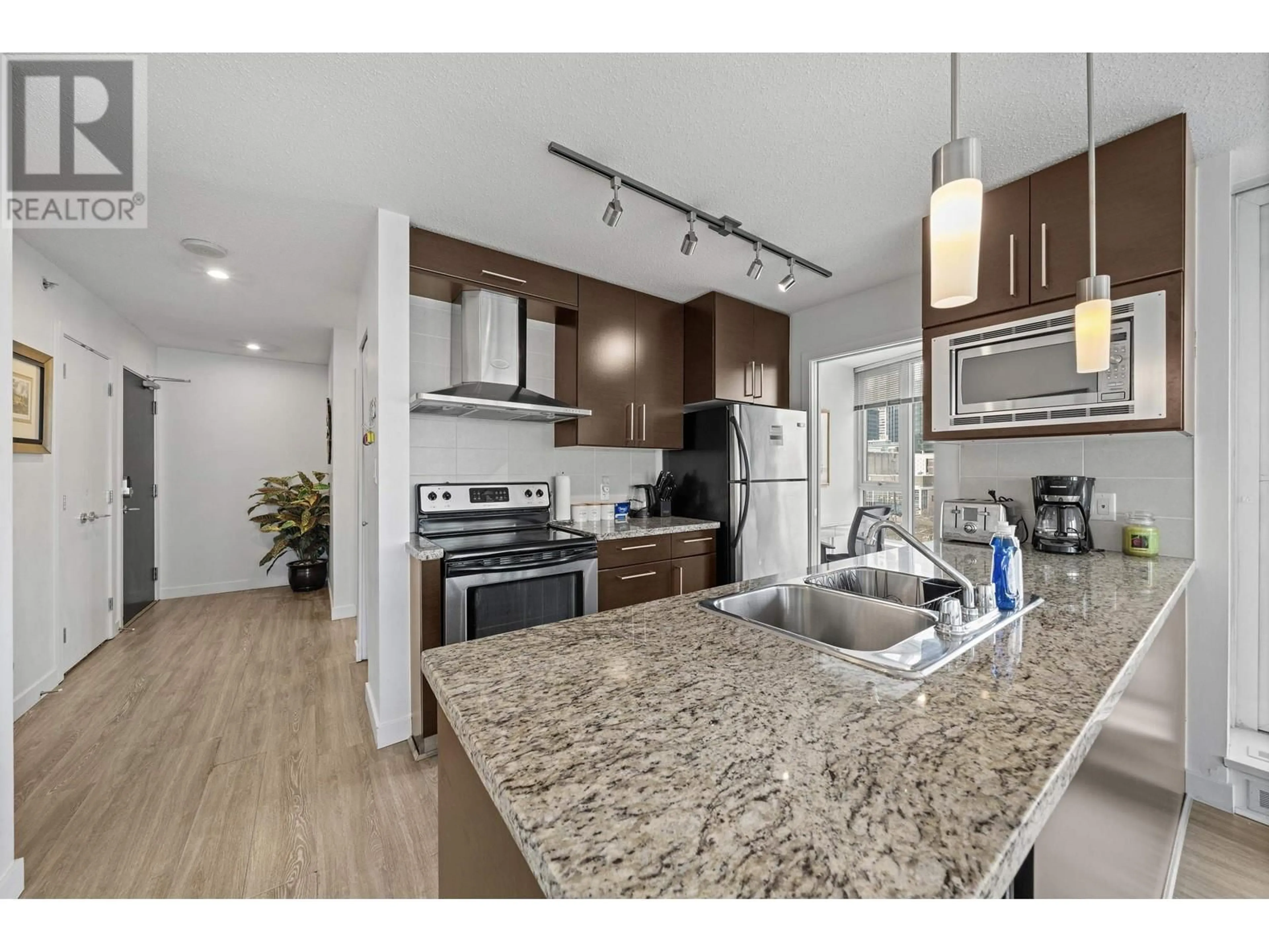 Open concept kitchen, unknown for 1703 188 KEEFER PLACE, Vancouver British Columbia V6B0J1