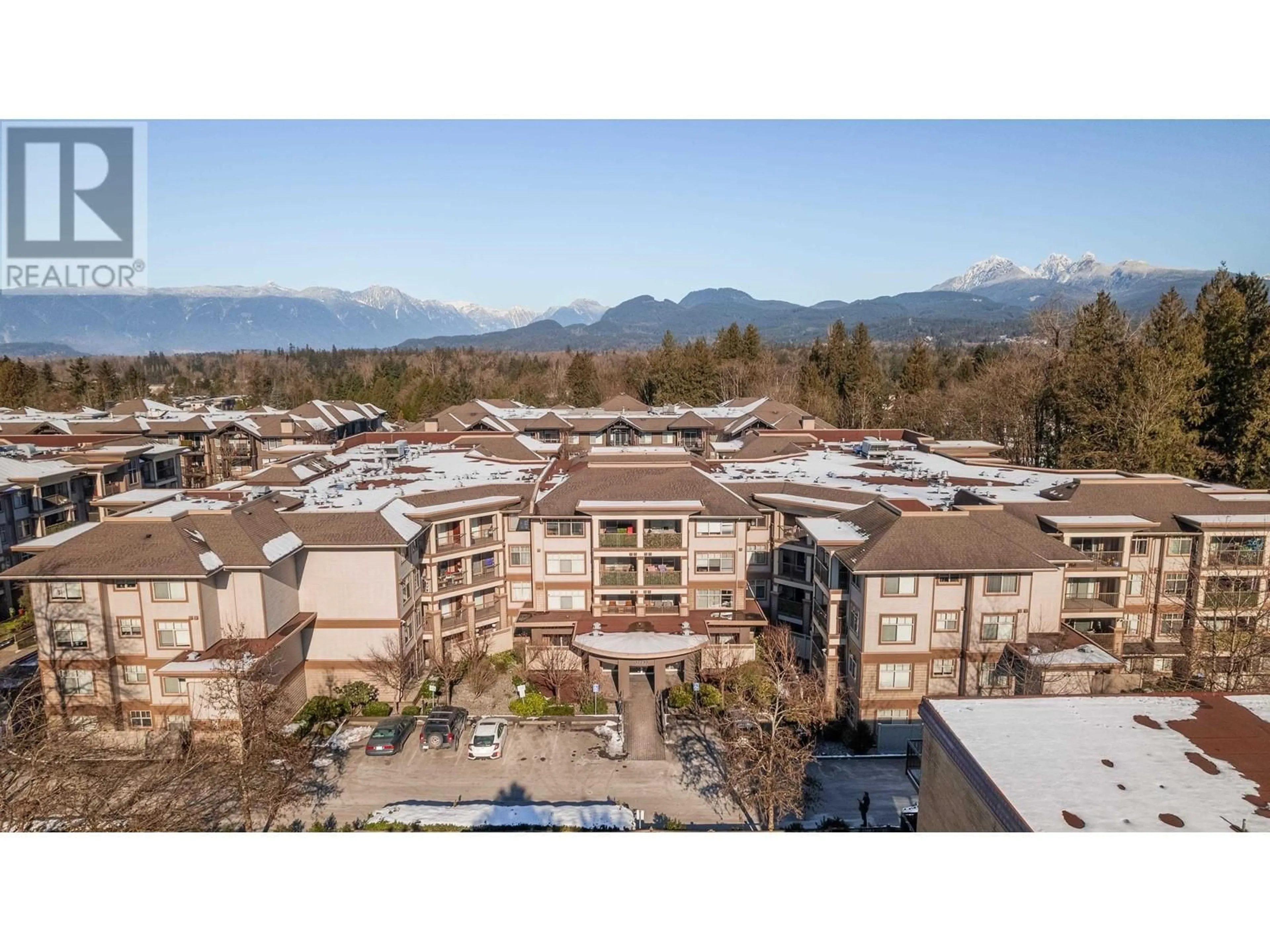 A pic from outside/outdoor area/front of a property/back of a property/a pic from drone, mountain view for 102 12248 224 STREET, Maple Ridge British Columbia V2X8W6