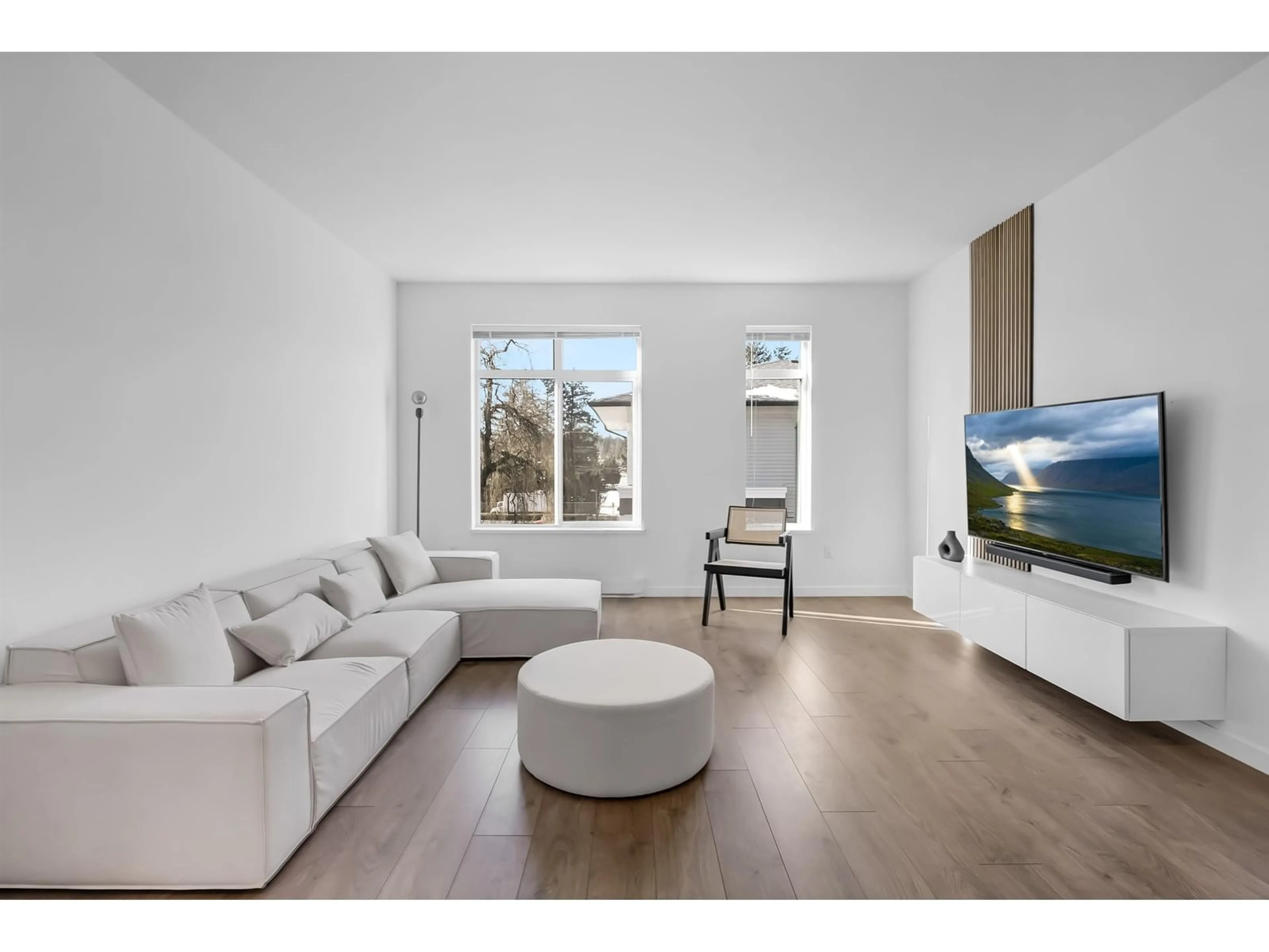 Living room with furniture, wood/laminate floor for 129 15235 SITKA DRIVE, Surrey British Columbia V3S0A9