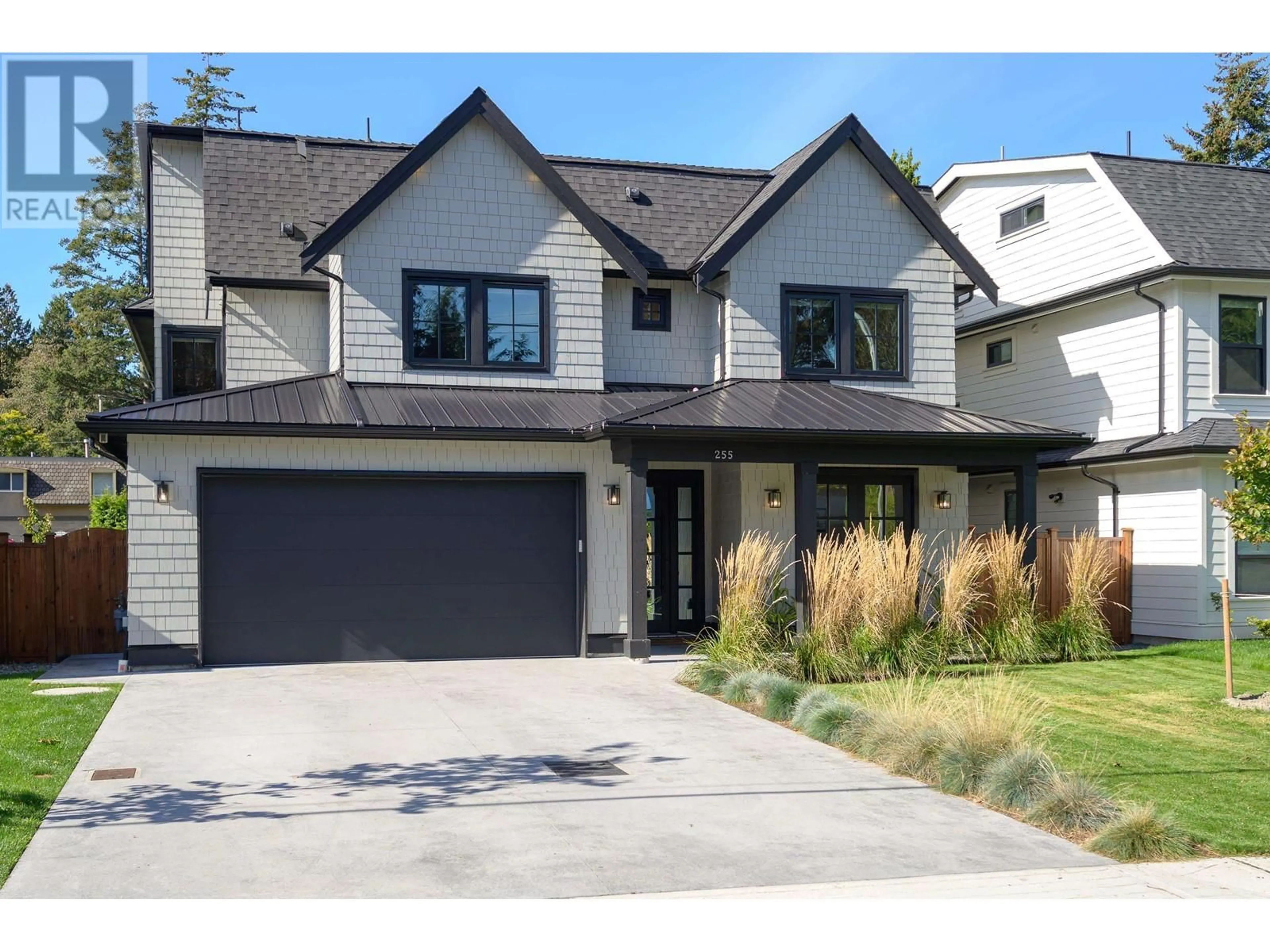 Home with brick exterior material, street for 255 54A STREET, Delta British Columbia V4M3J2