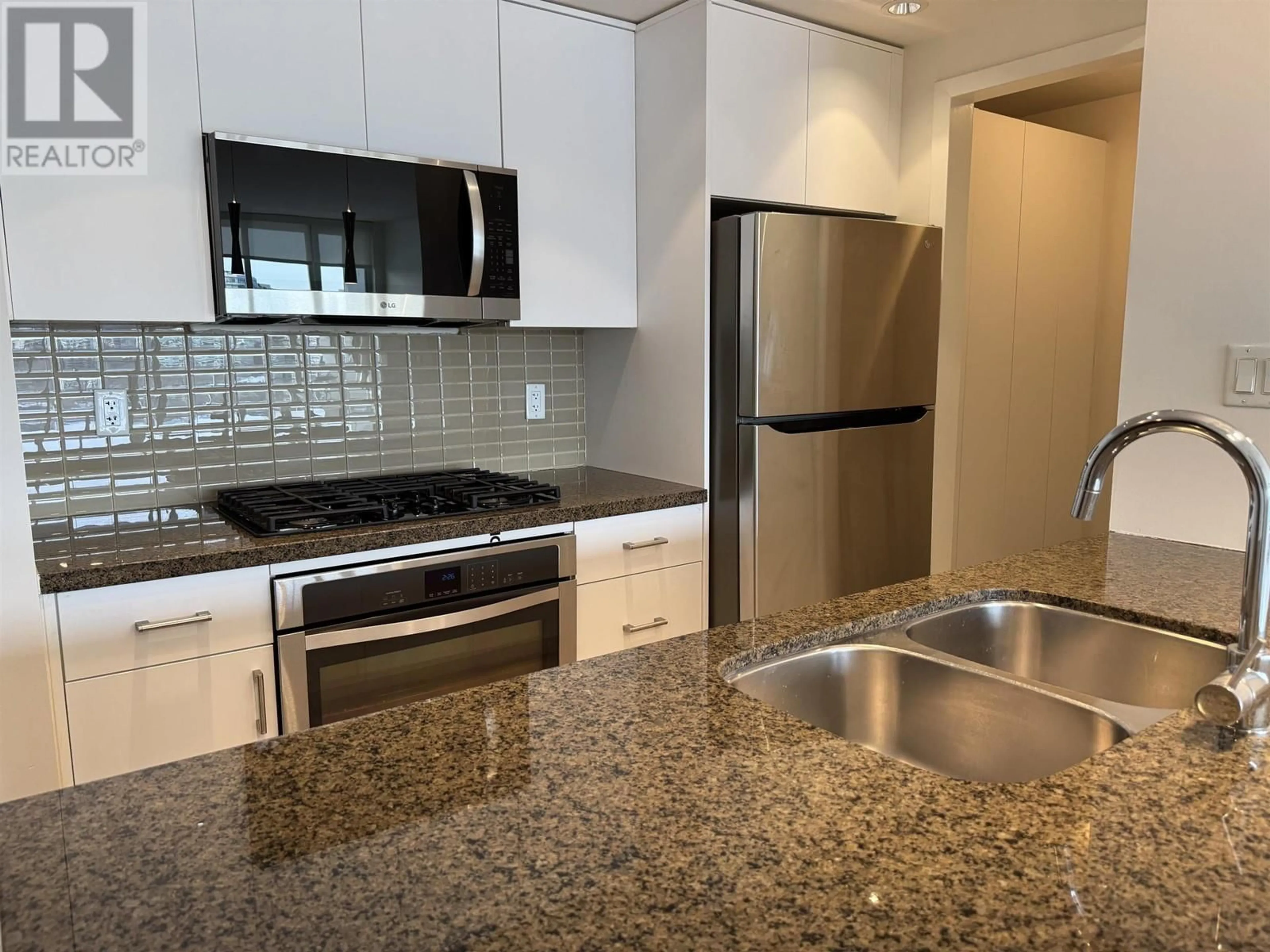 Standard kitchen, ceramic/tile floor for 907 980 COOPERAGE WAY, Vancouver British Columbia V6B0C3