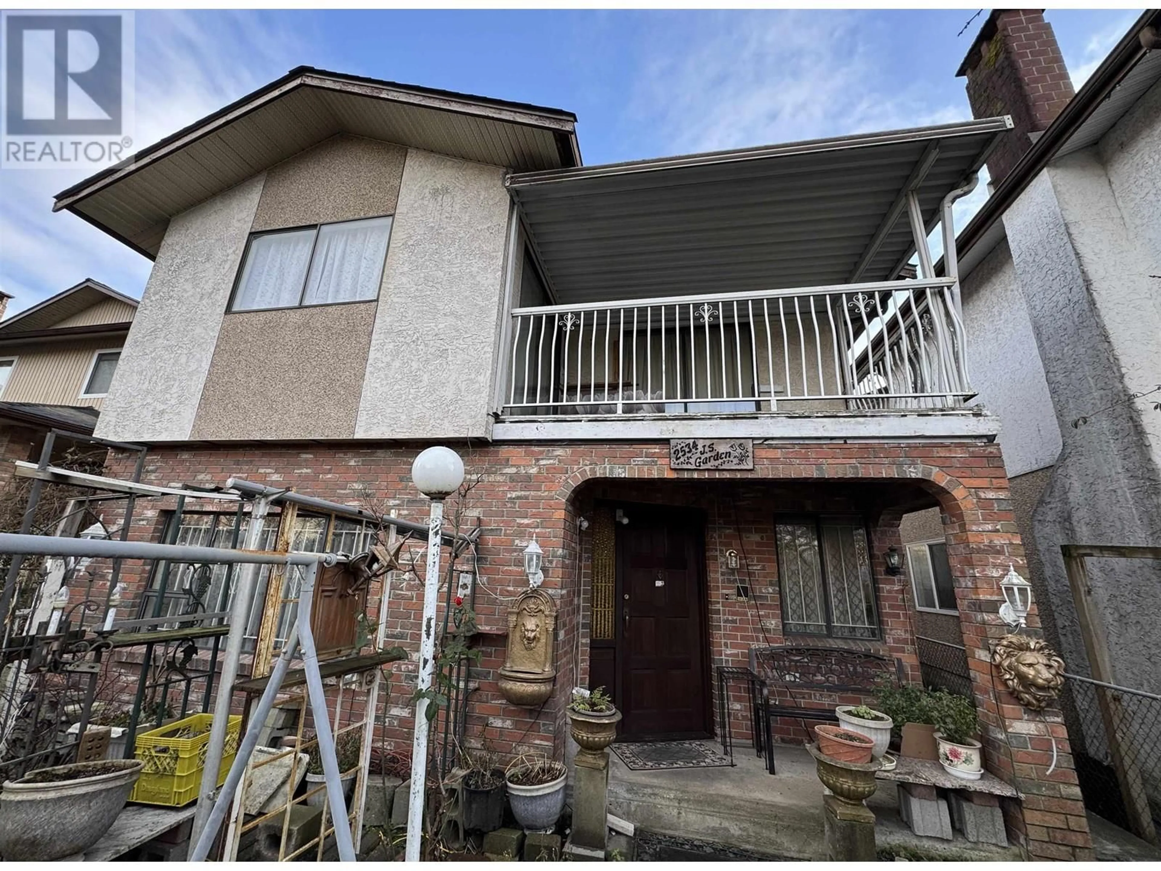 Home with brick exterior material, building for 2534 E 21ST AVENUE, Vancouver British Columbia V5M2V8