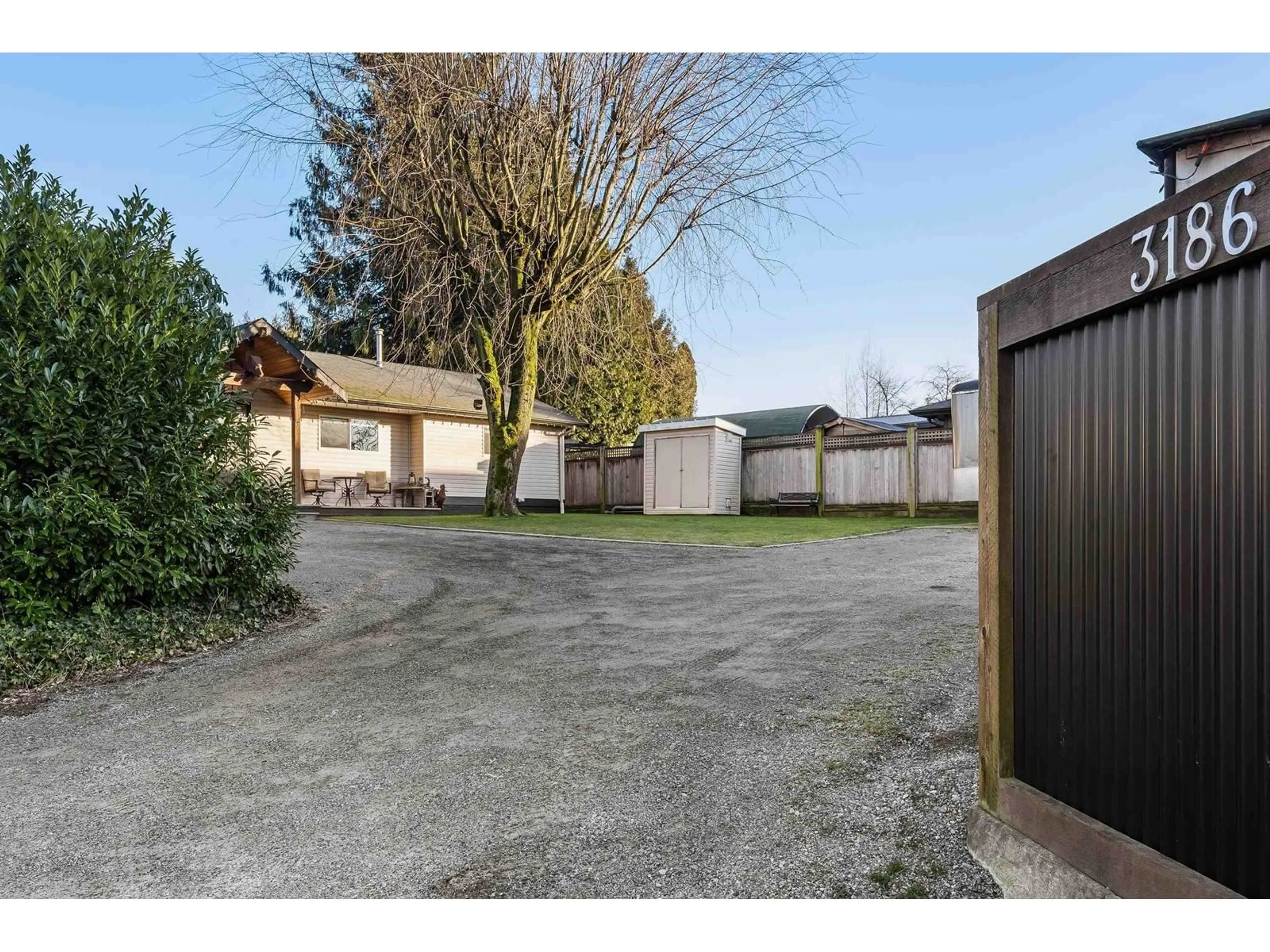 A pic from outside/outdoor area/front of a property/back of a property/a pic from drone, street for 3186 BRADNER ROAD, Abbotsford British Columbia V4K1K2