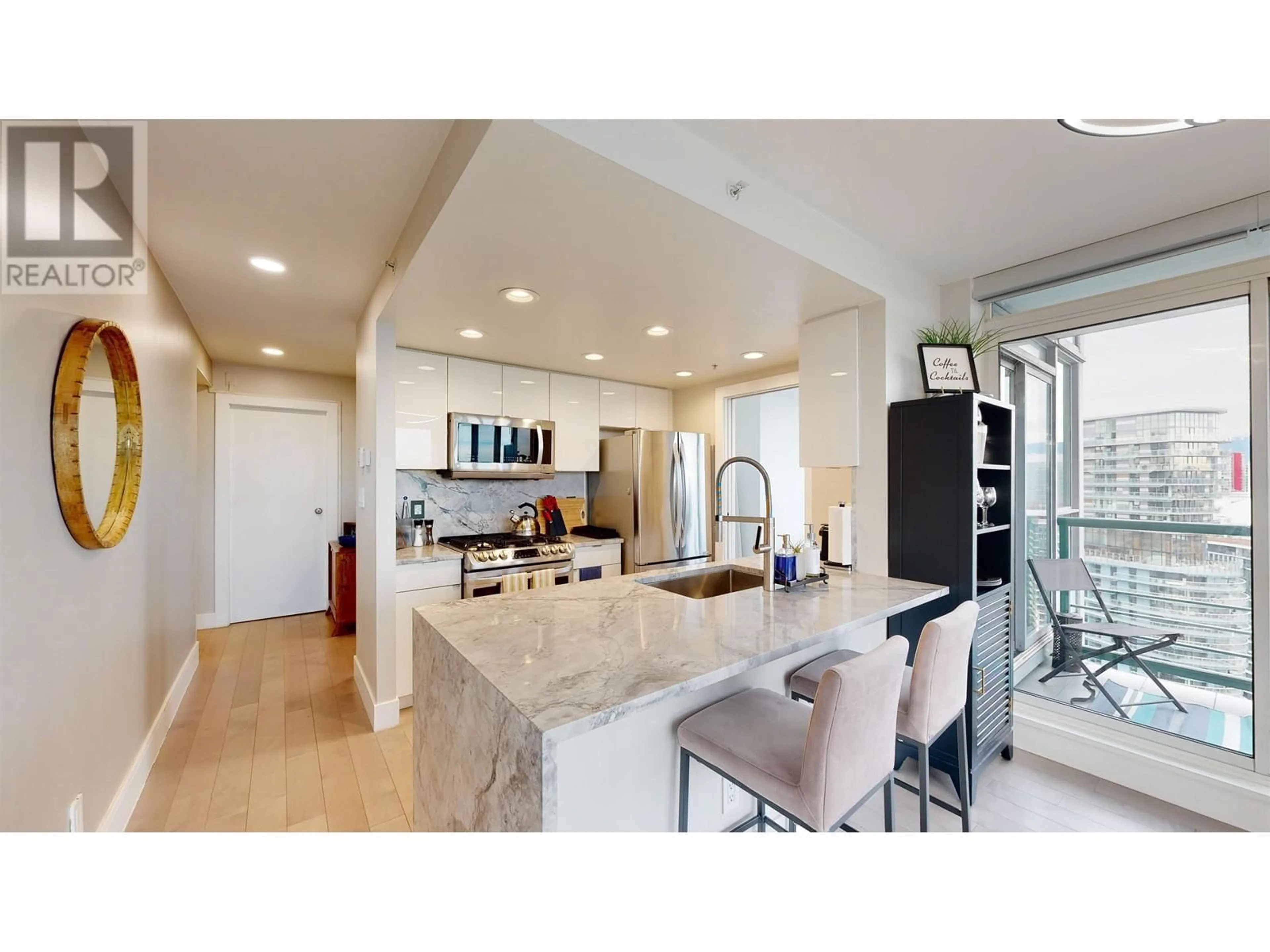 Open concept kitchen, ceramic/tile floor for 3103 1033 MARINASIDE CRESCENT, Vancouver British Columbia V6Z3A3