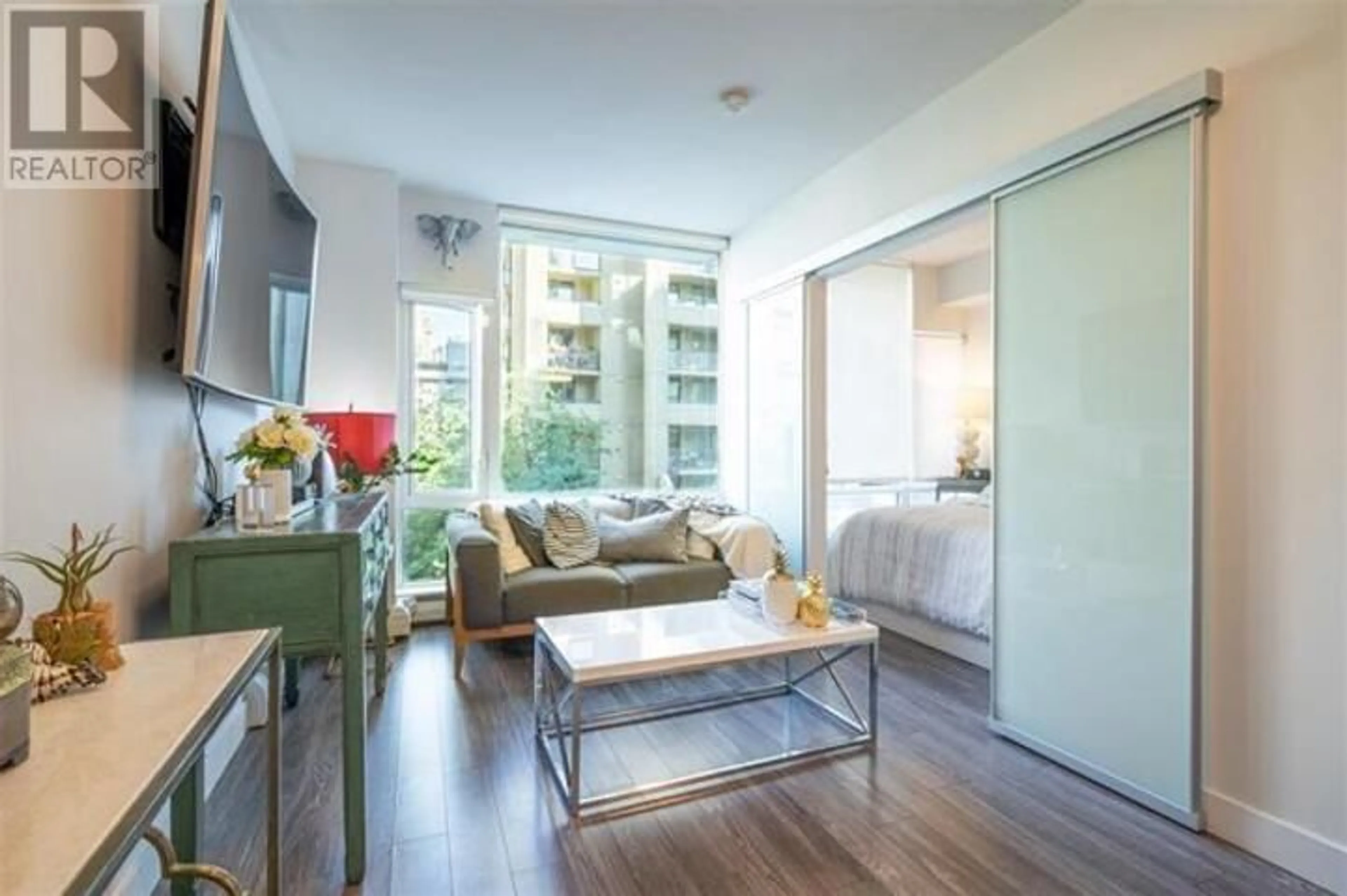 Living room with furniture, wood/laminate floor for 405 - 1283 HOWE STREET, Vancouver British Columbia V6Z0E3