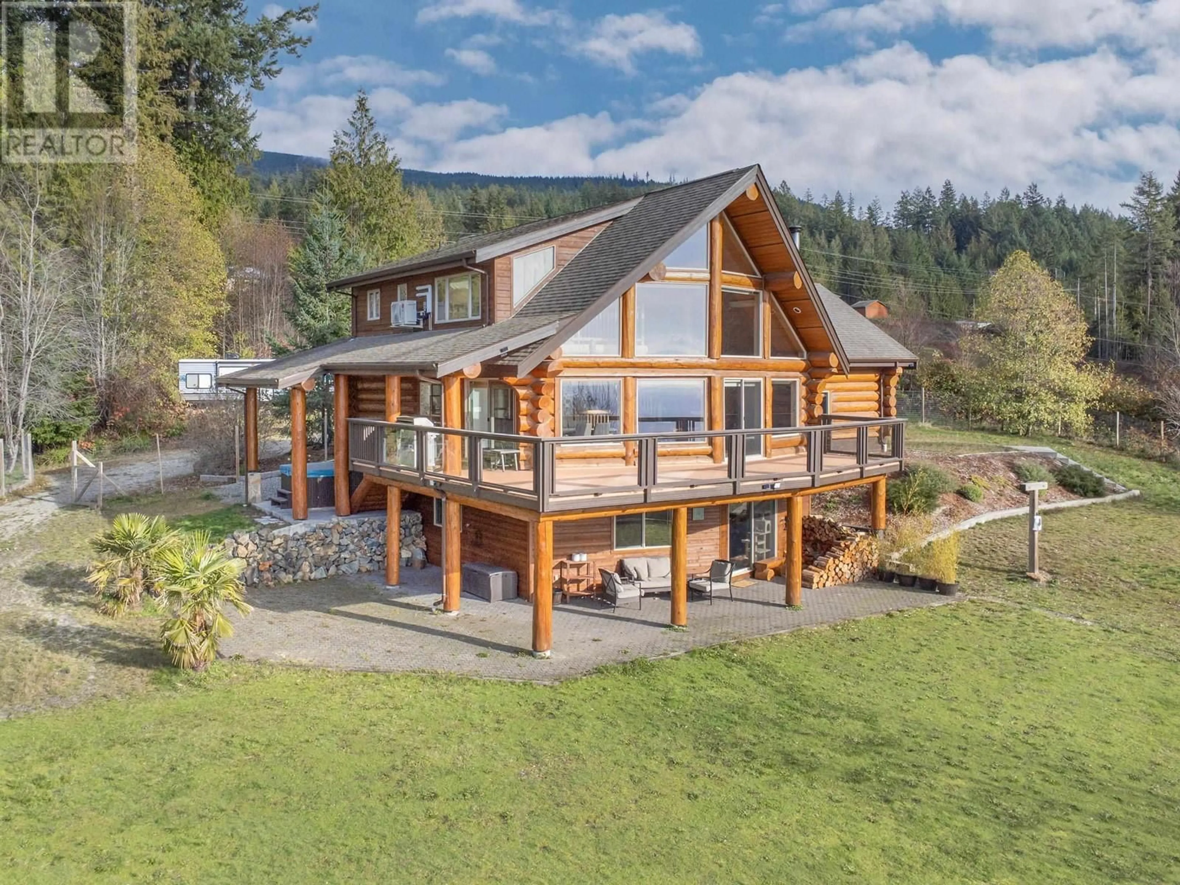 A pic from outside/outdoor area/front of a property/back of a property/a pic from drone, water/lake/river/ocean view for 1041 FIRBURN ROAD, Roberts Creek British Columbia V0N2W5