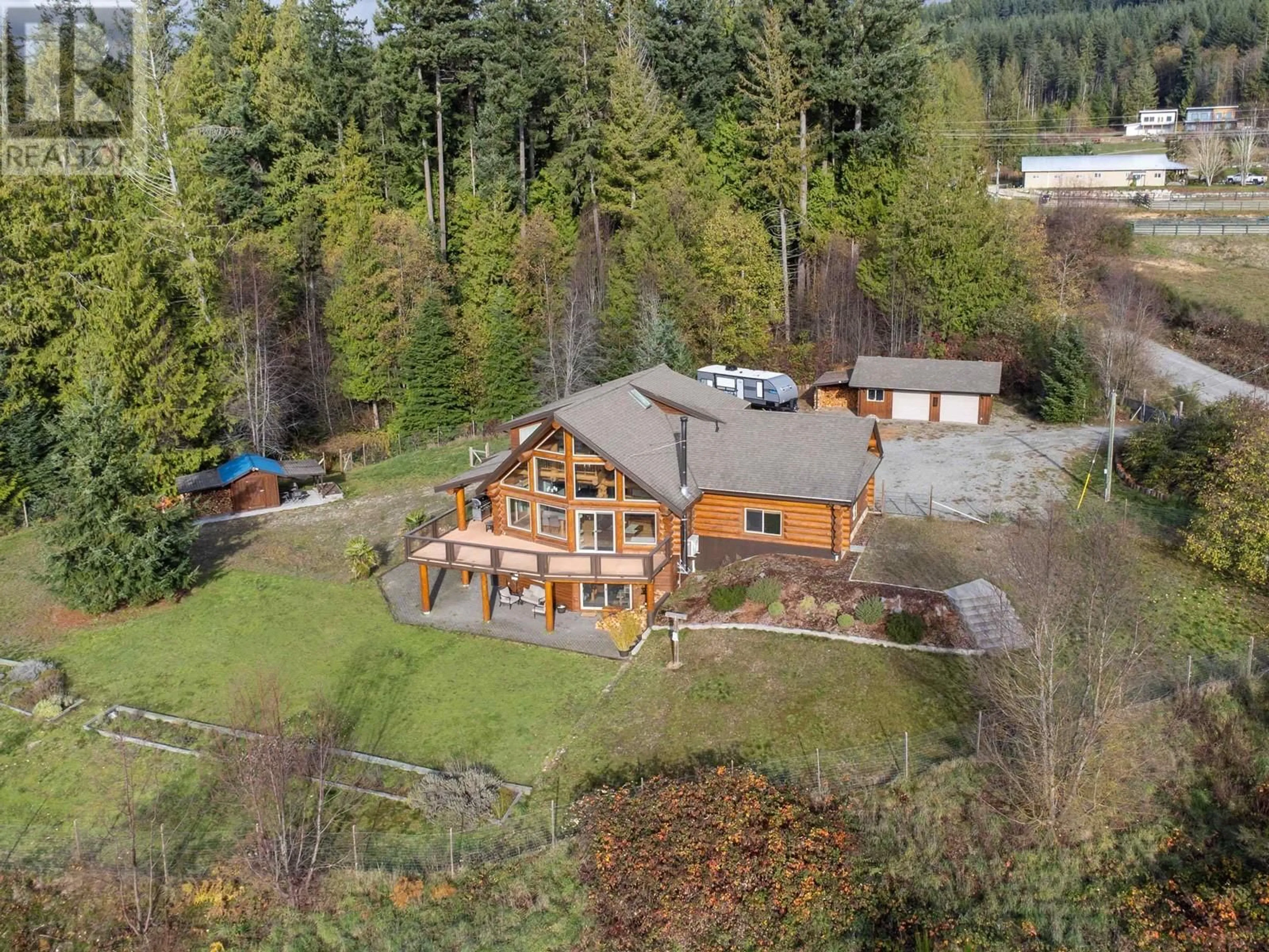 A pic from outside/outdoor area/front of a property/back of a property/a pic from drone, unknown for 1041 FIRBURN ROAD, Roberts Creek British Columbia V0N2W5