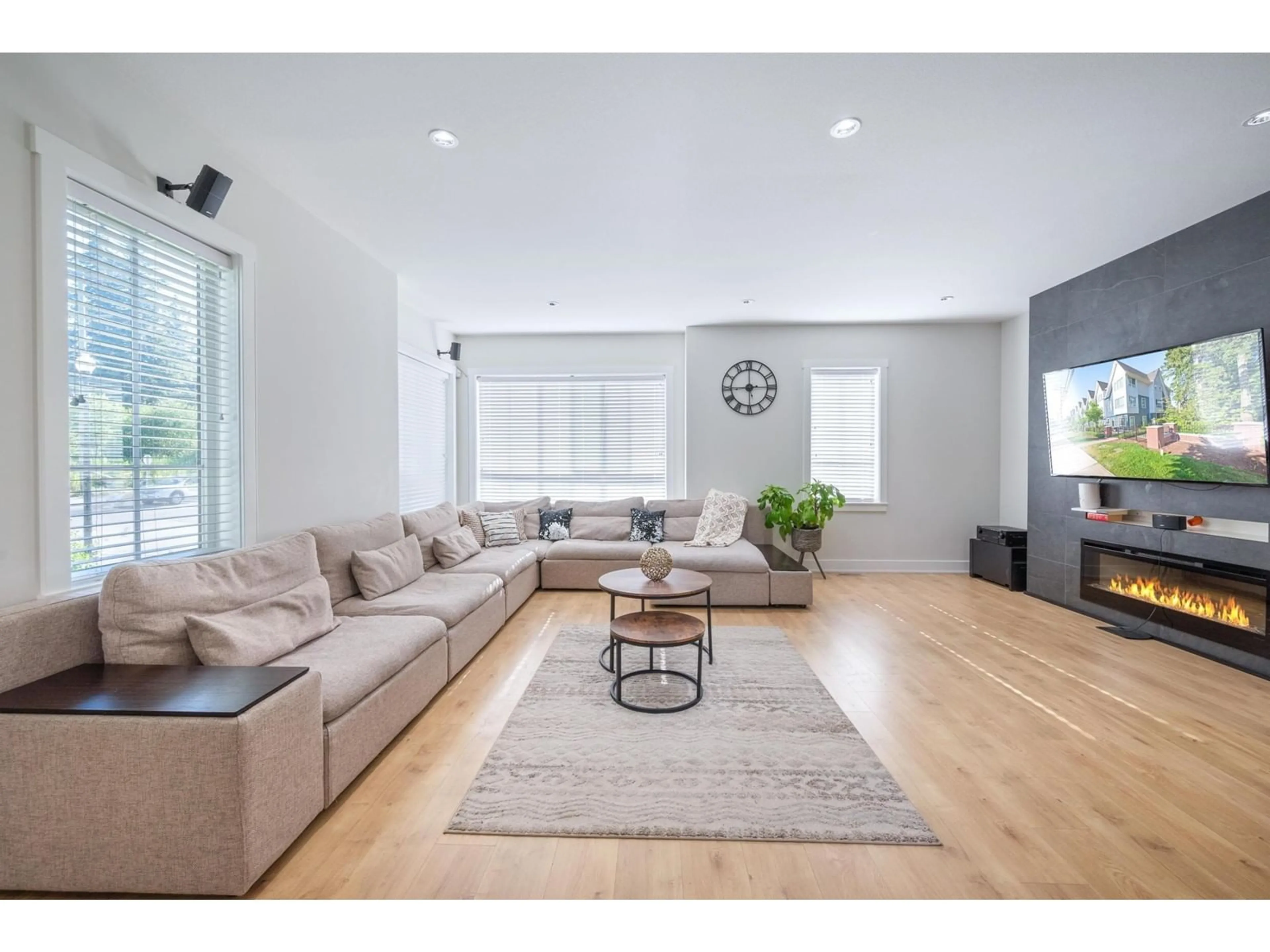 Living room with furniture, wood/laminate floor for 8 2828 156 STREET, Surrey British Columbia V3Z0C7