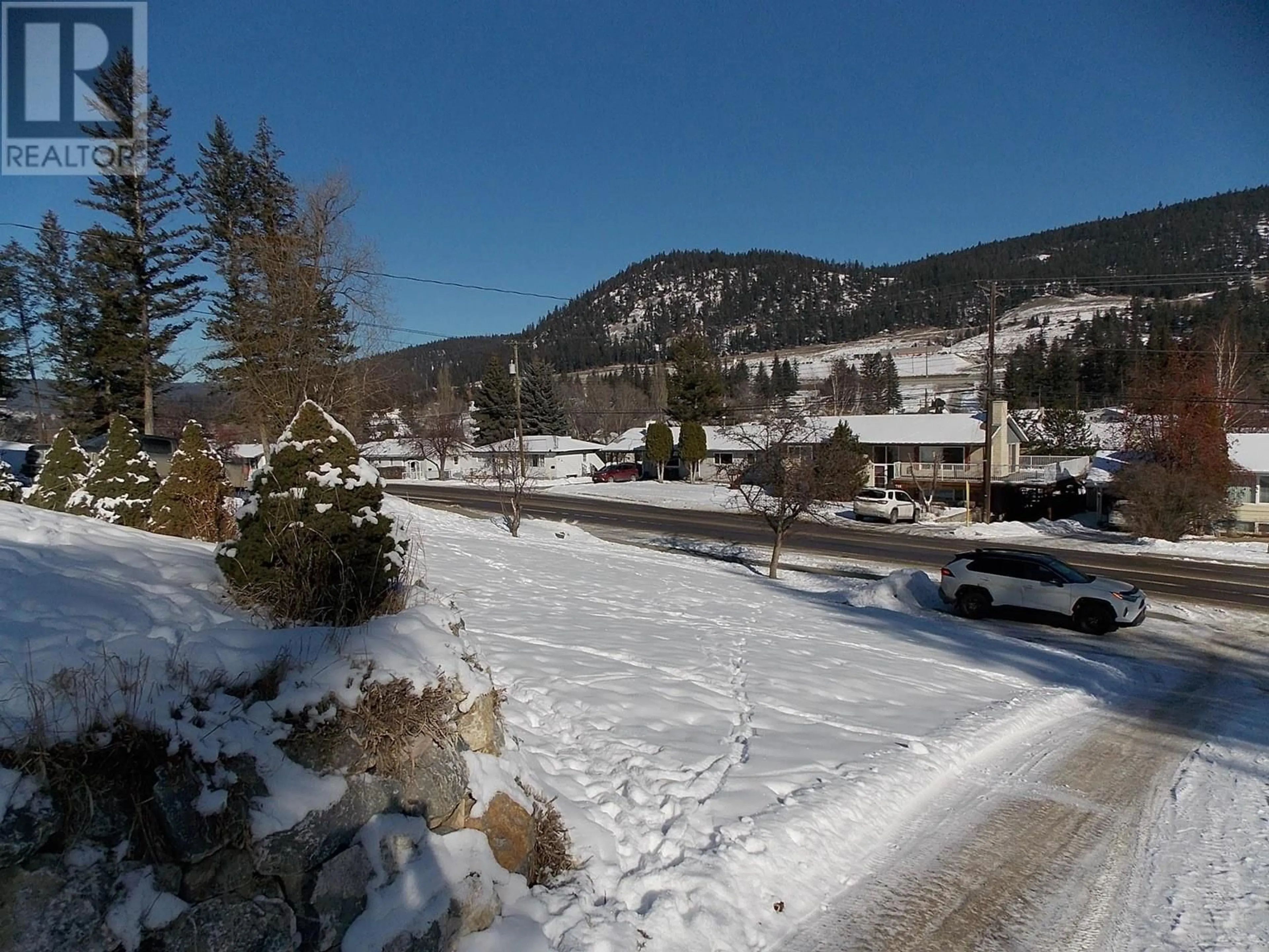 A pic from outside/outdoor area/front of a property/back of a property/a pic from drone, mountain view for 711 WESTERN AVENUE, Williams Lake British Columbia V2G2J2