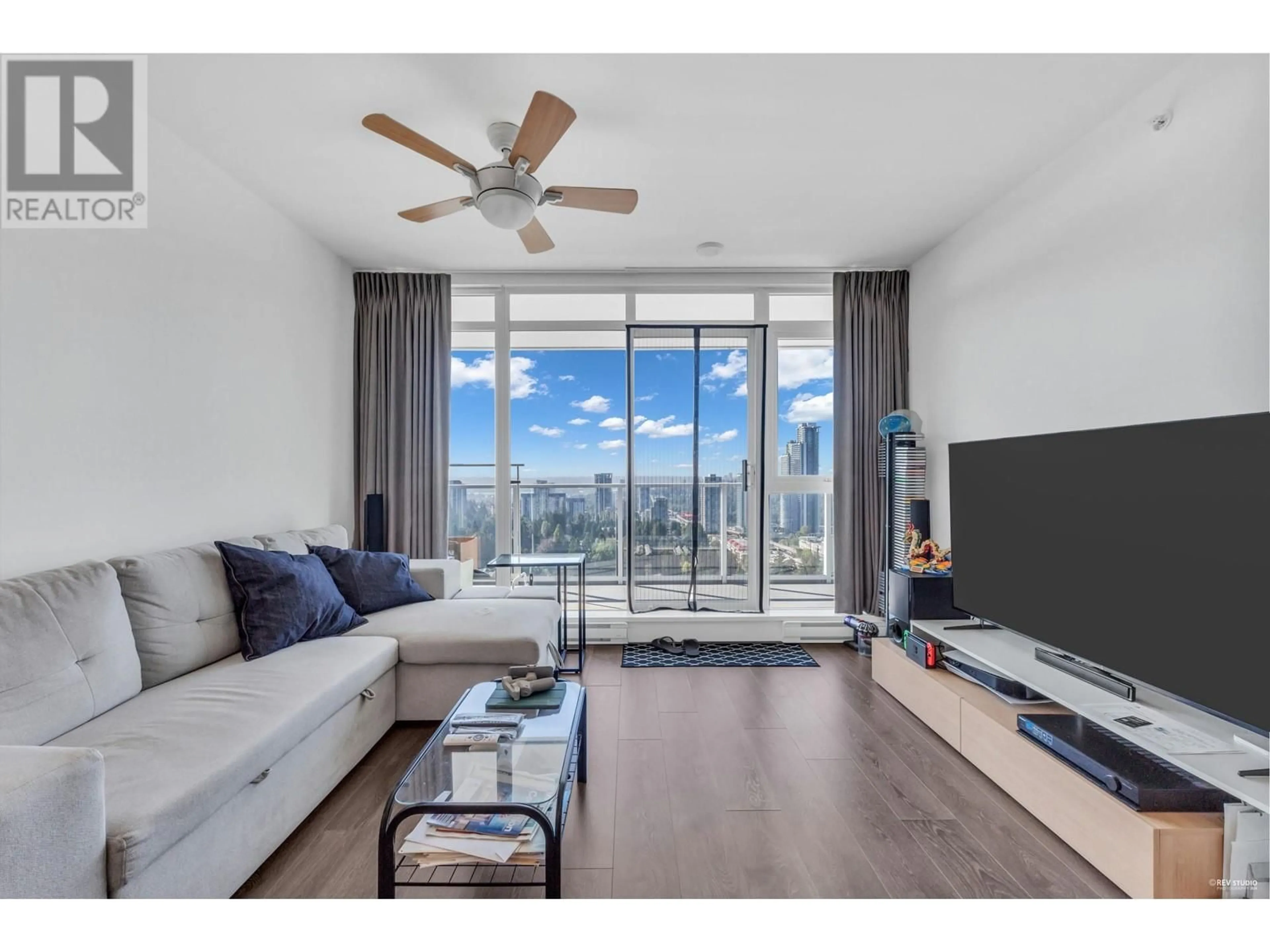 Living room with furniture, wood/laminate floor for 2202 525 FOSTER AVENUE, Coquitlam British Columbia V3J0H6