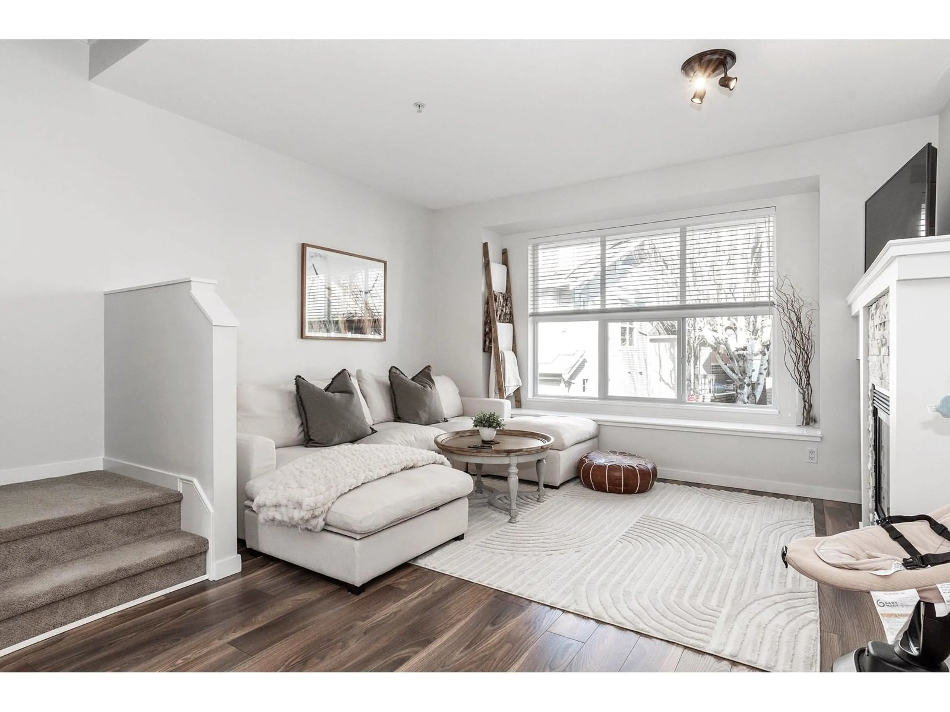 Living room with furniture, wood/laminate floor for 30 20460 66 AVENUE, Langley British Columbia V2Y3B6