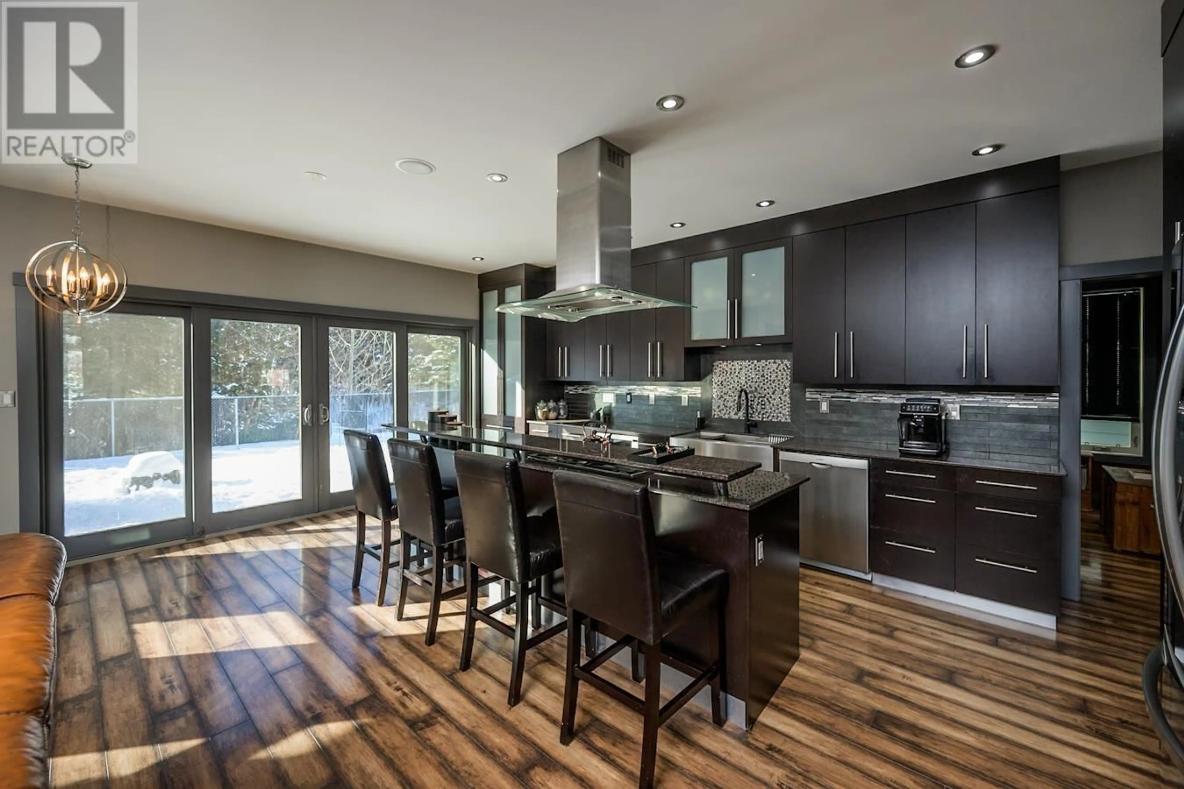 Contemporary kitchen, wood/laminate floor for 7645 LOEDEL CRESCENT, Prince George British Columbia V2N0A5