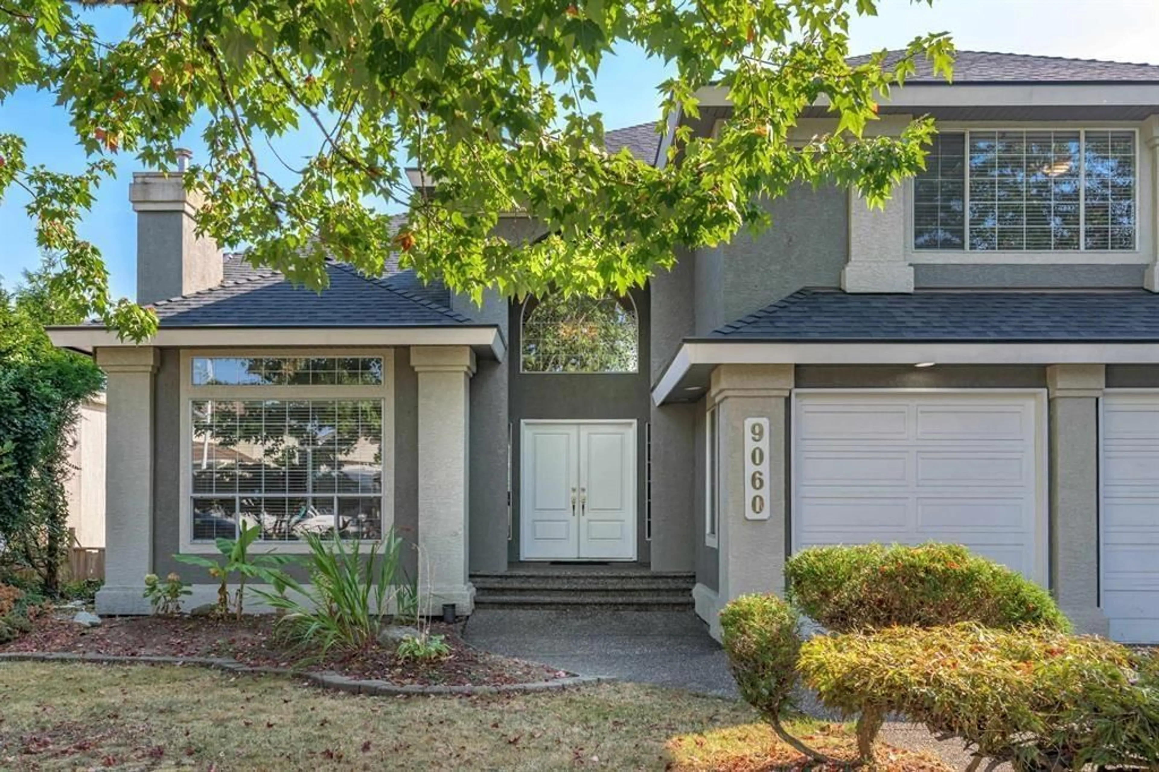 Home with vinyl exterior material, street for 9060 162, Surrey British Columbia V4N3L5