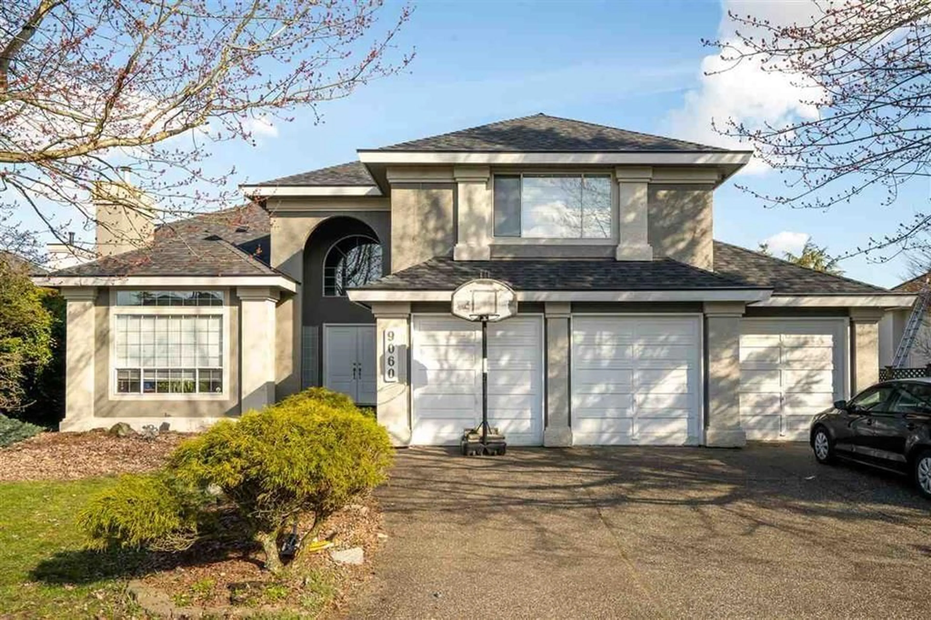 Home with vinyl exterior material, street for 9060 162 STREET, Surrey British Columbia V4N3L5