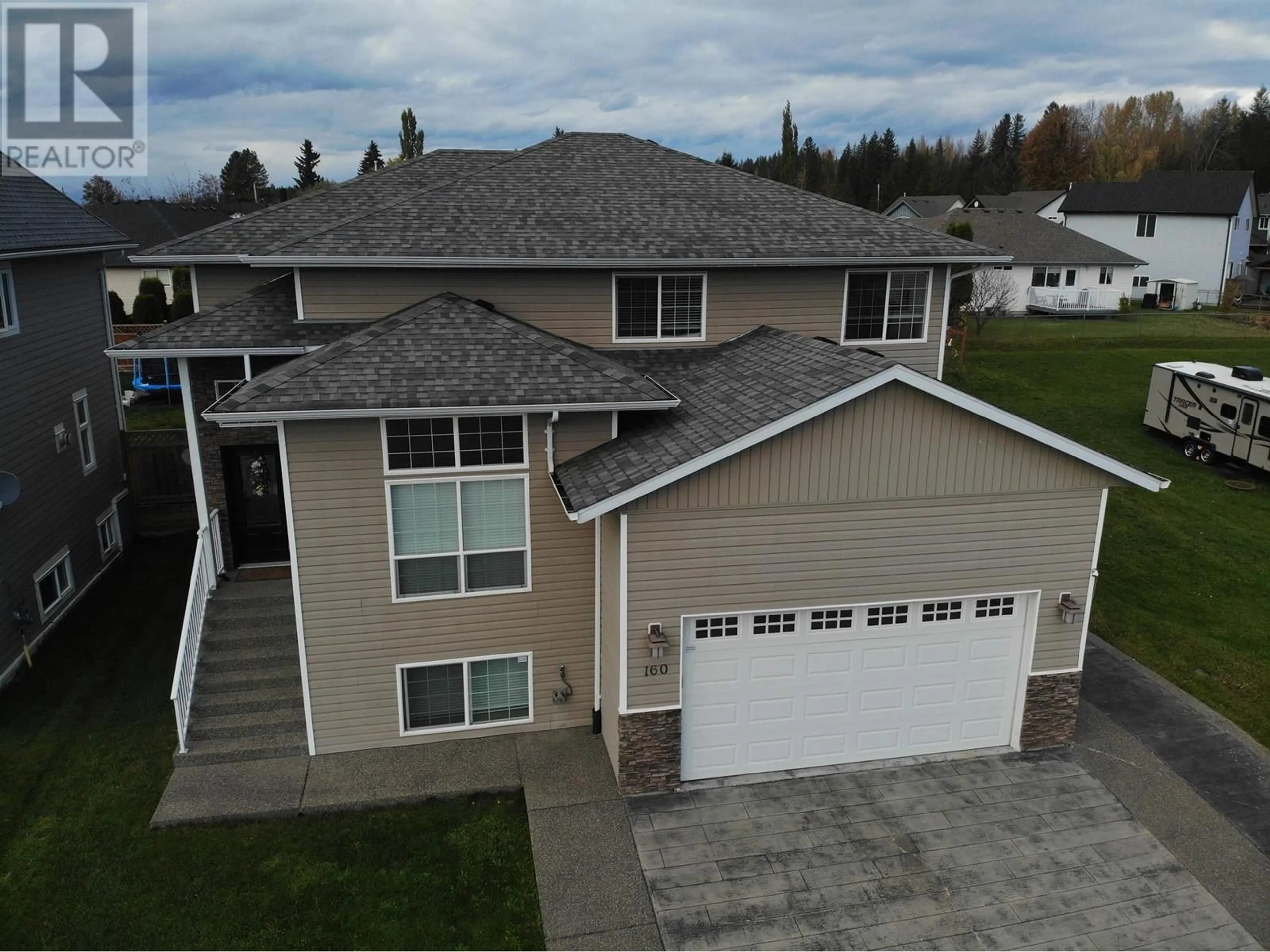 A pic from outside/outdoor area/front of a property/back of a property/a pic from drone, street for 160 NICKEL RIDGE AVENUE, Quesnel British Columbia V2J6P6