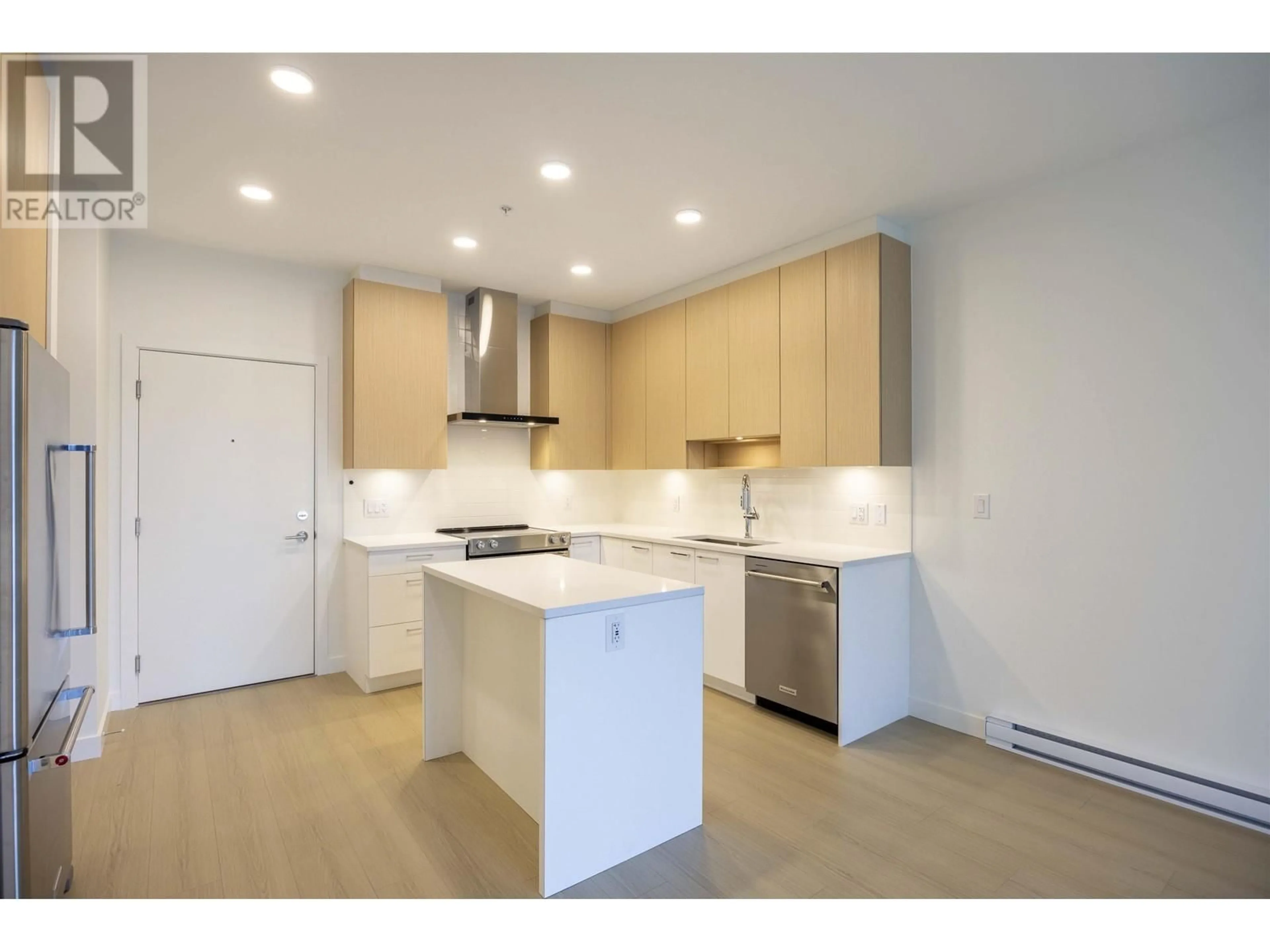 Open concept kitchen, wood/laminate floor for 304 7599 15TH STREET, Burnaby British Columbia V3N0H9