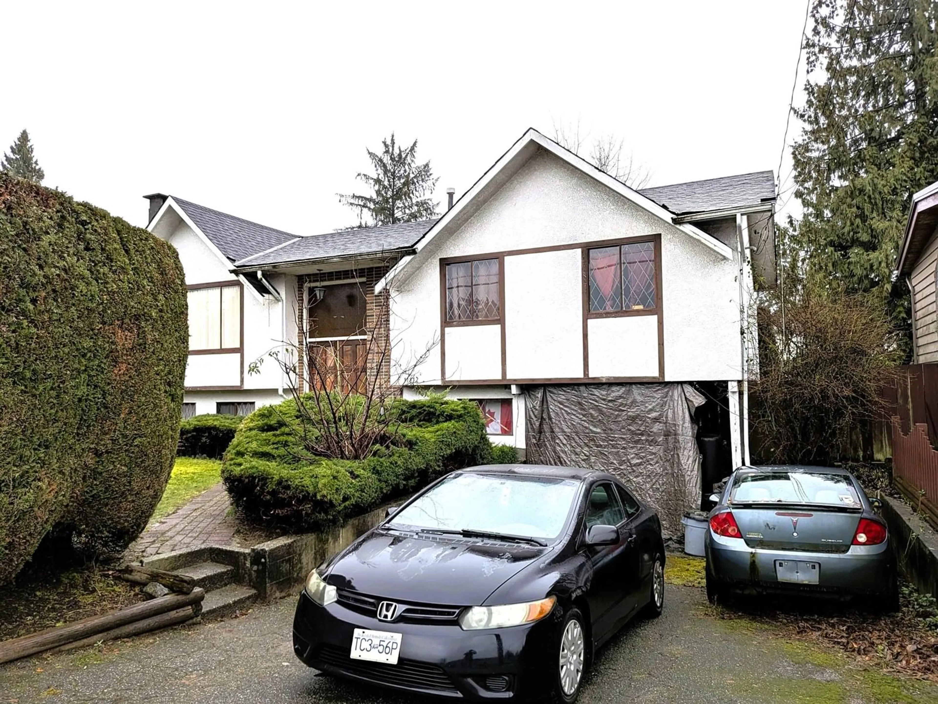 Home with vinyl exterior material, street for 11812 85A AVENUE, Delta British Columbia V4C2V6