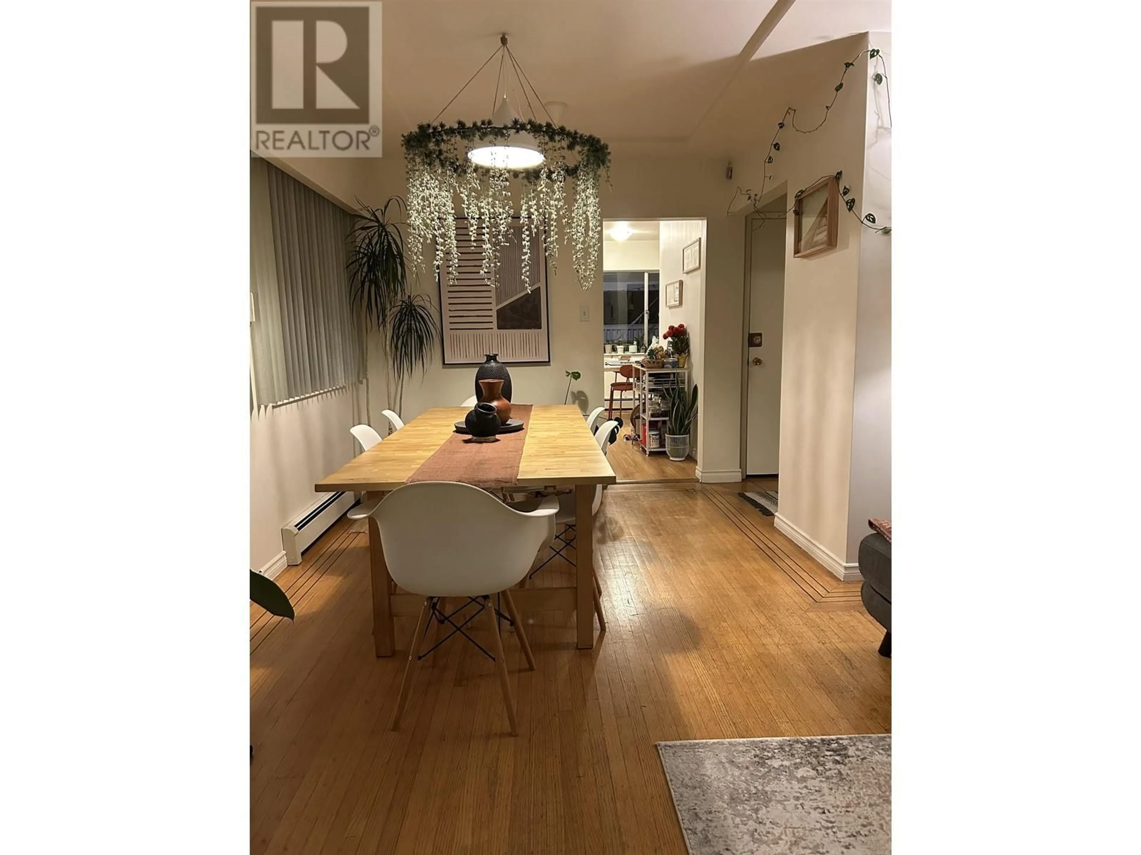 Dining room, wood/laminate floor for 3514 8TH AVENUE, Vancouver British Columbia V6R1Y7