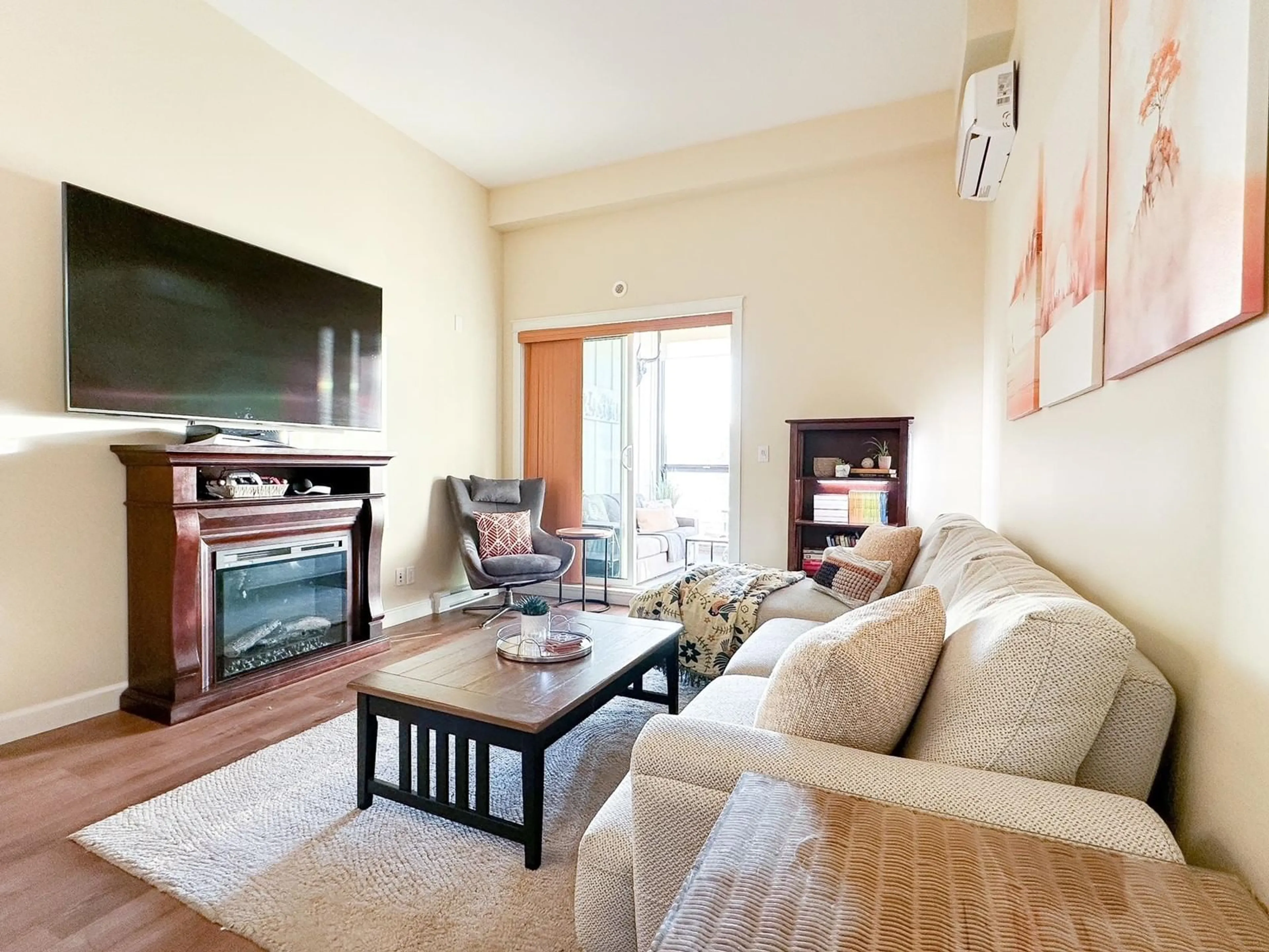 Living room with furniture, wood/laminate floor for 603 20367 85 AVENUE, Langley British Columbia V2Y3R1