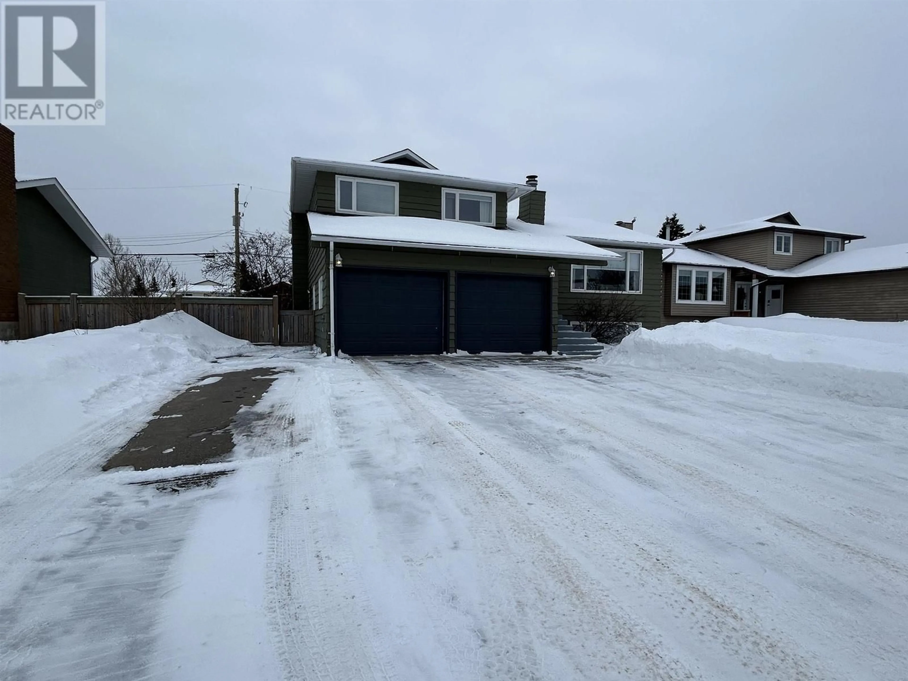 A pic from outside/outdoor area/front of a property/back of a property/a pic from drone, street for 9511 106 AVENUE, Fort St. John British Columbia V1J4V8