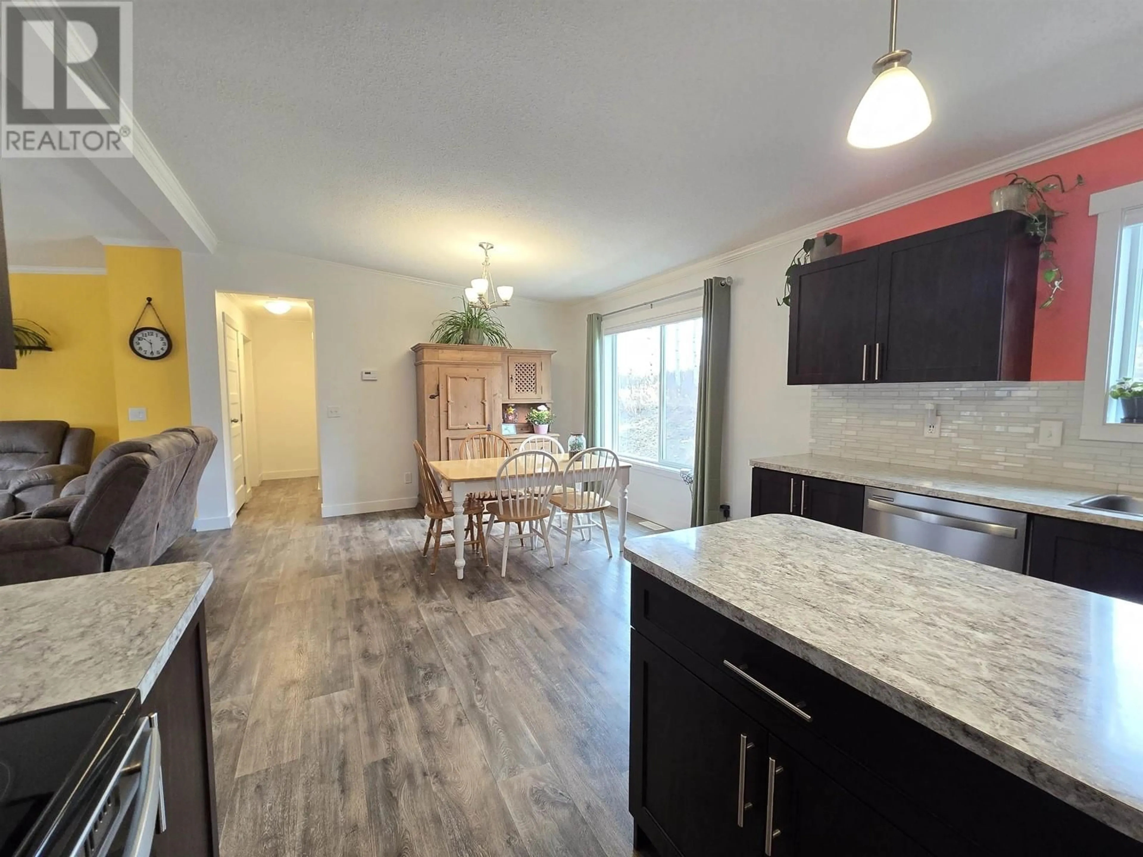 Open concept kitchen, wood/laminate floor for 455 HORSESHOE LAKE ROAD, McBride British Columbia V0J2E0