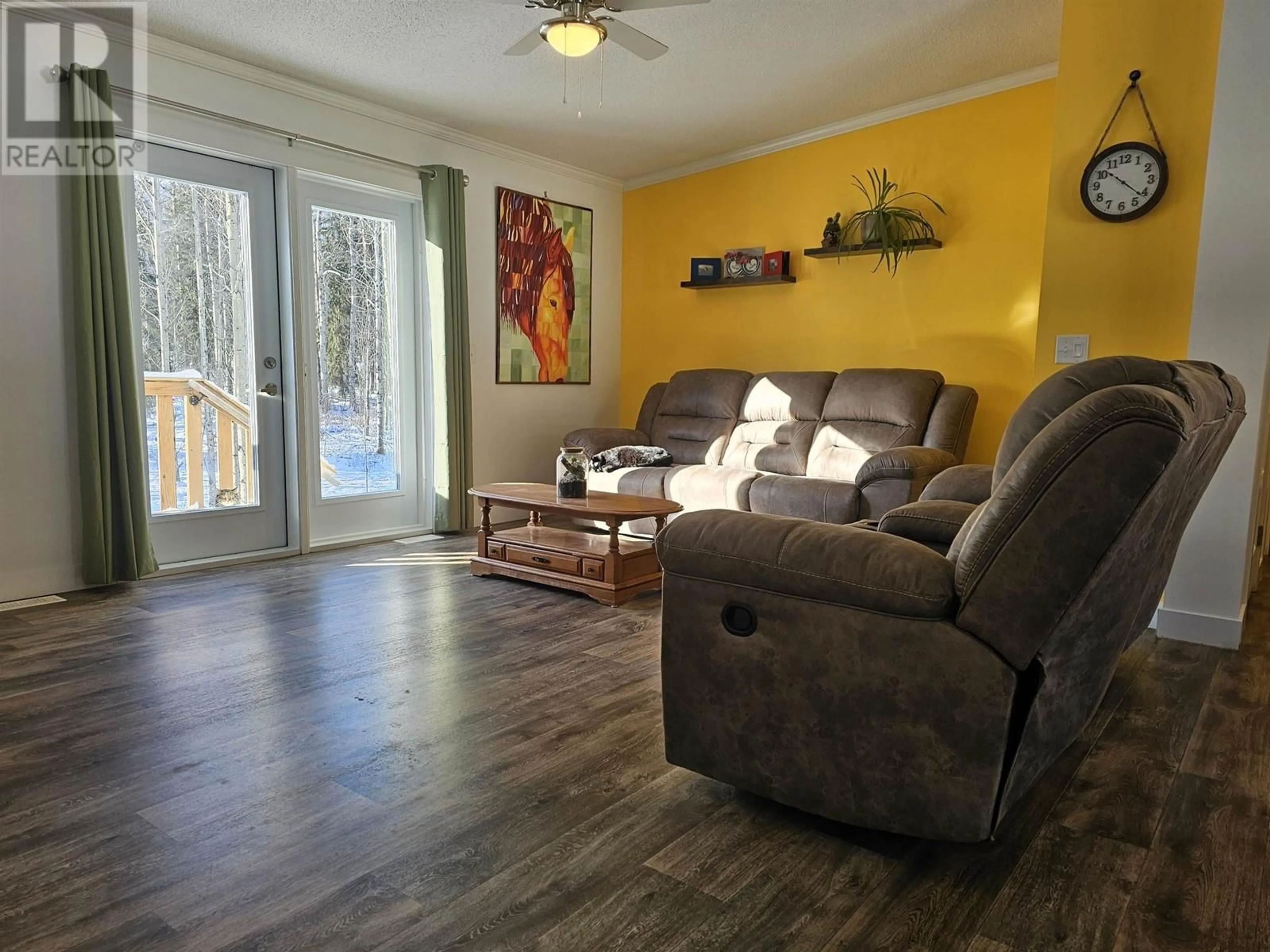 Living room with furniture, wood/laminate floor for 455 HORSESHOE LAKE ROAD, McBride British Columbia V0J2E0