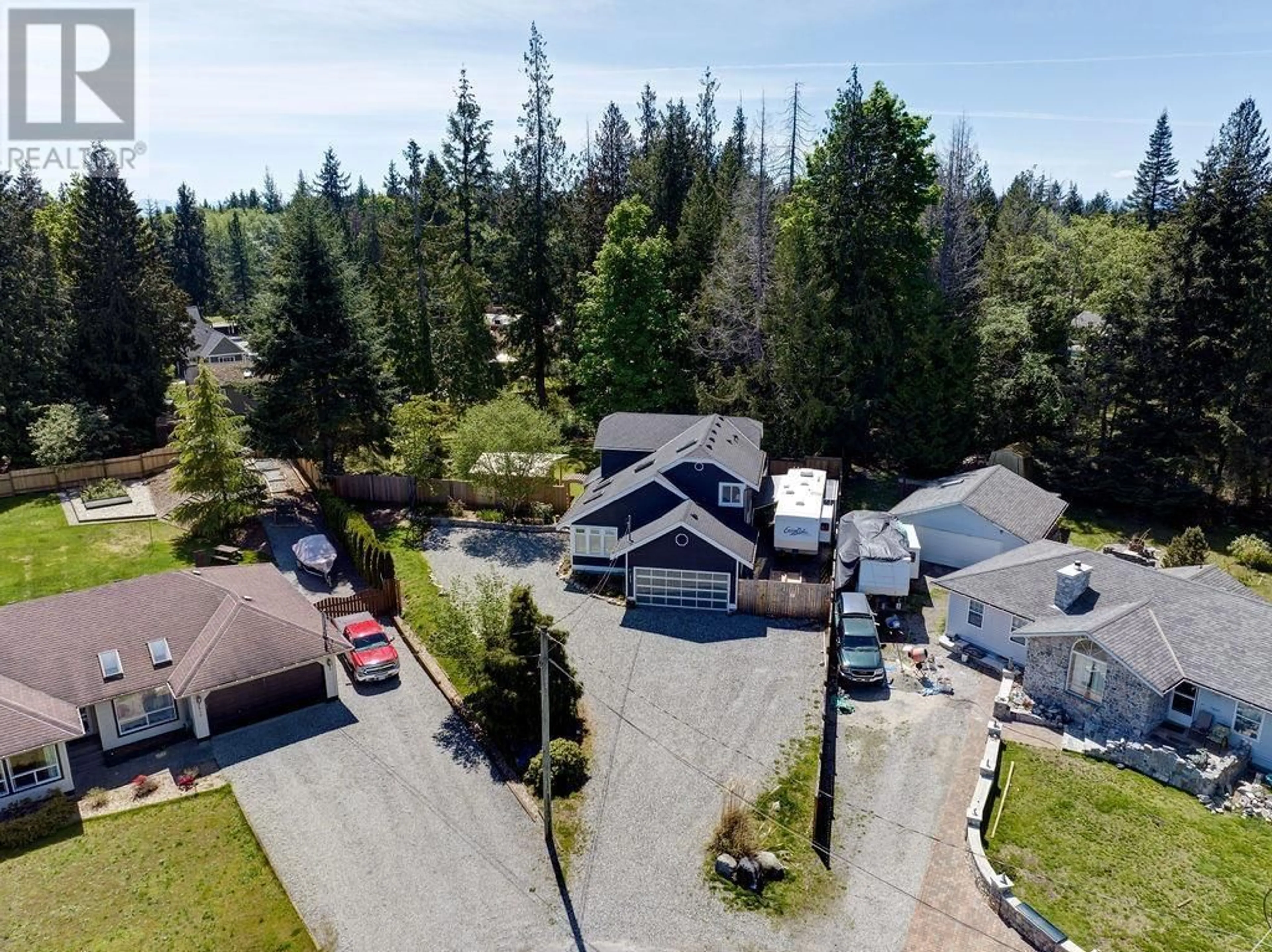 A pic from outside/outdoor area/front of a property/back of a property/a pic from drone, unknown for 7843 EAGLE DRIVE, Halfmoon Bay British Columbia V7Z1A3