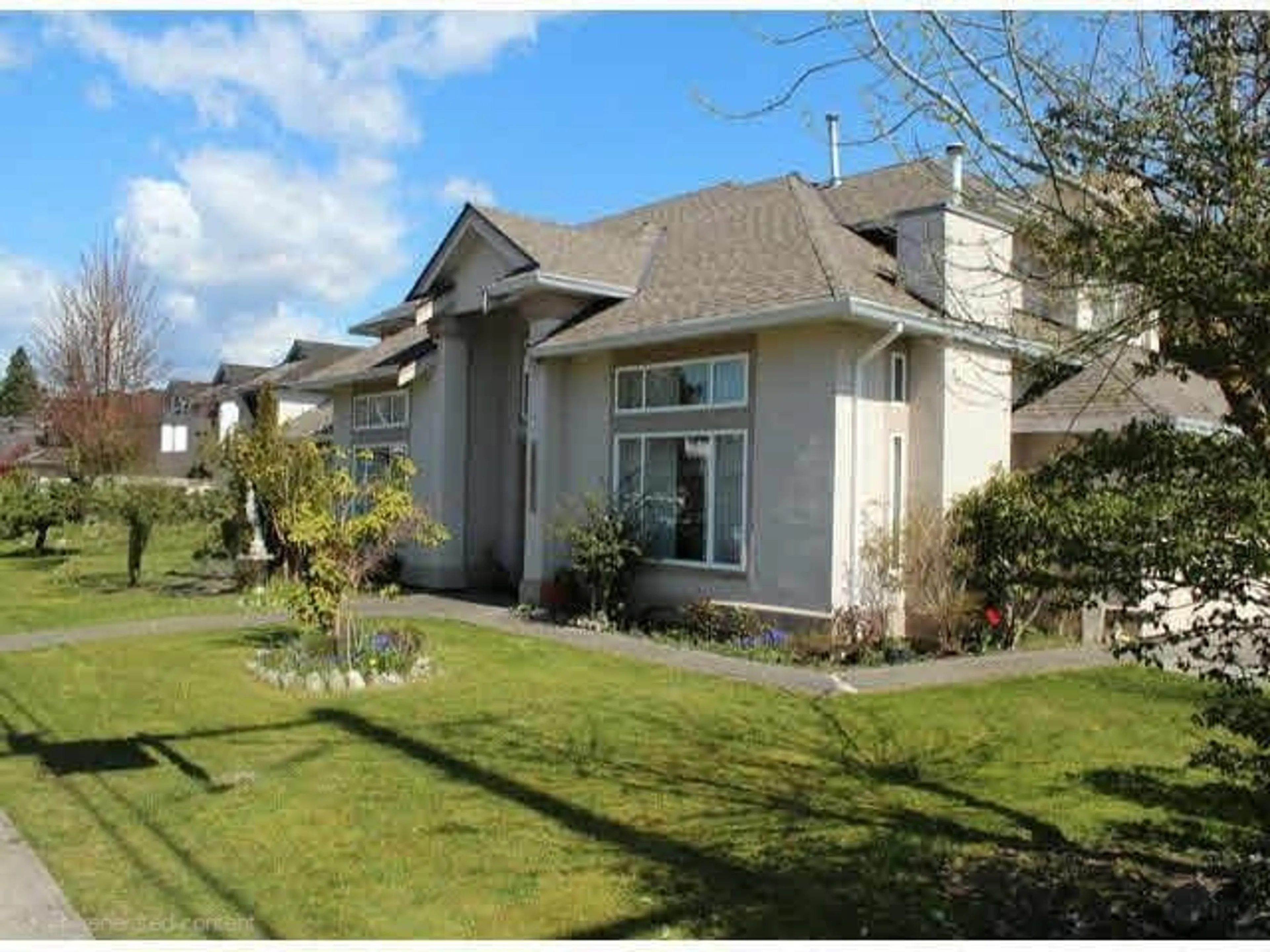 Home with vinyl exterior material, street for 16011 110 AVENUE, Surrey British Columbia V4N1R1