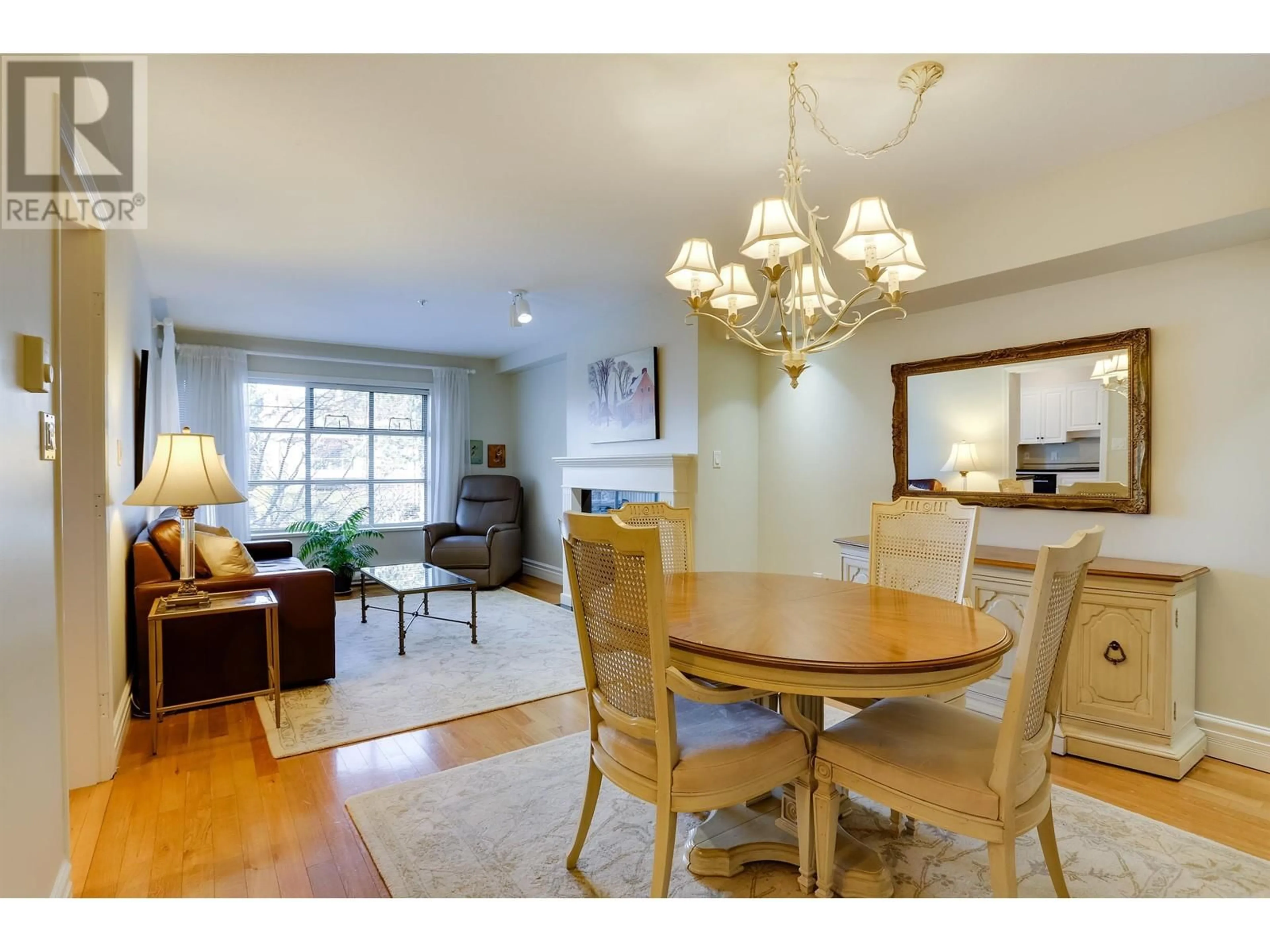 Dining room, wood/laminate floor for 205 1118 55TH STREET, Delta British Columbia V4M3J8