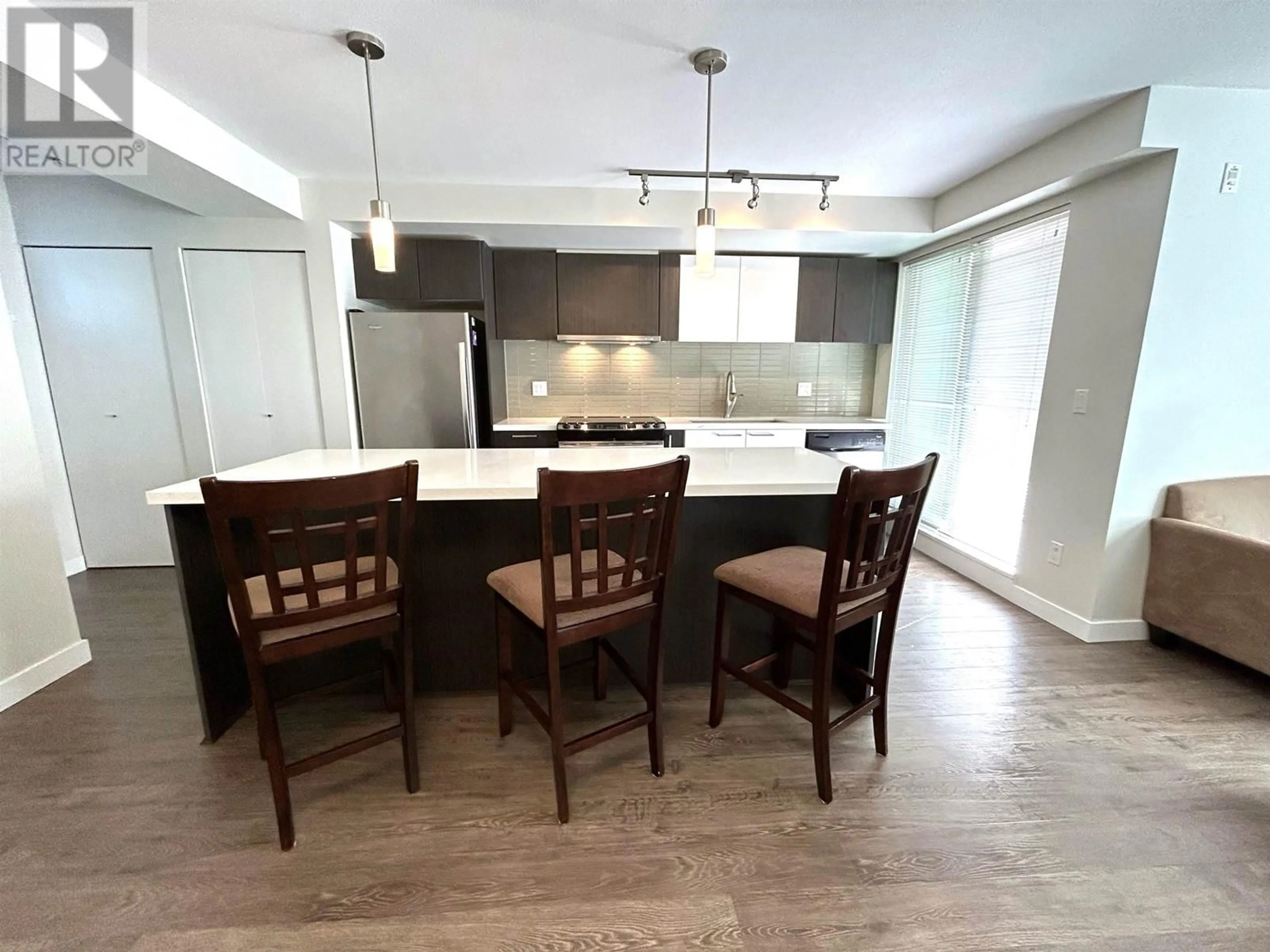 Open concept kitchen, wood/laminate floor for 210 618 LANGSIDE AVENUE, Coquitlam British Columbia V3J0B8