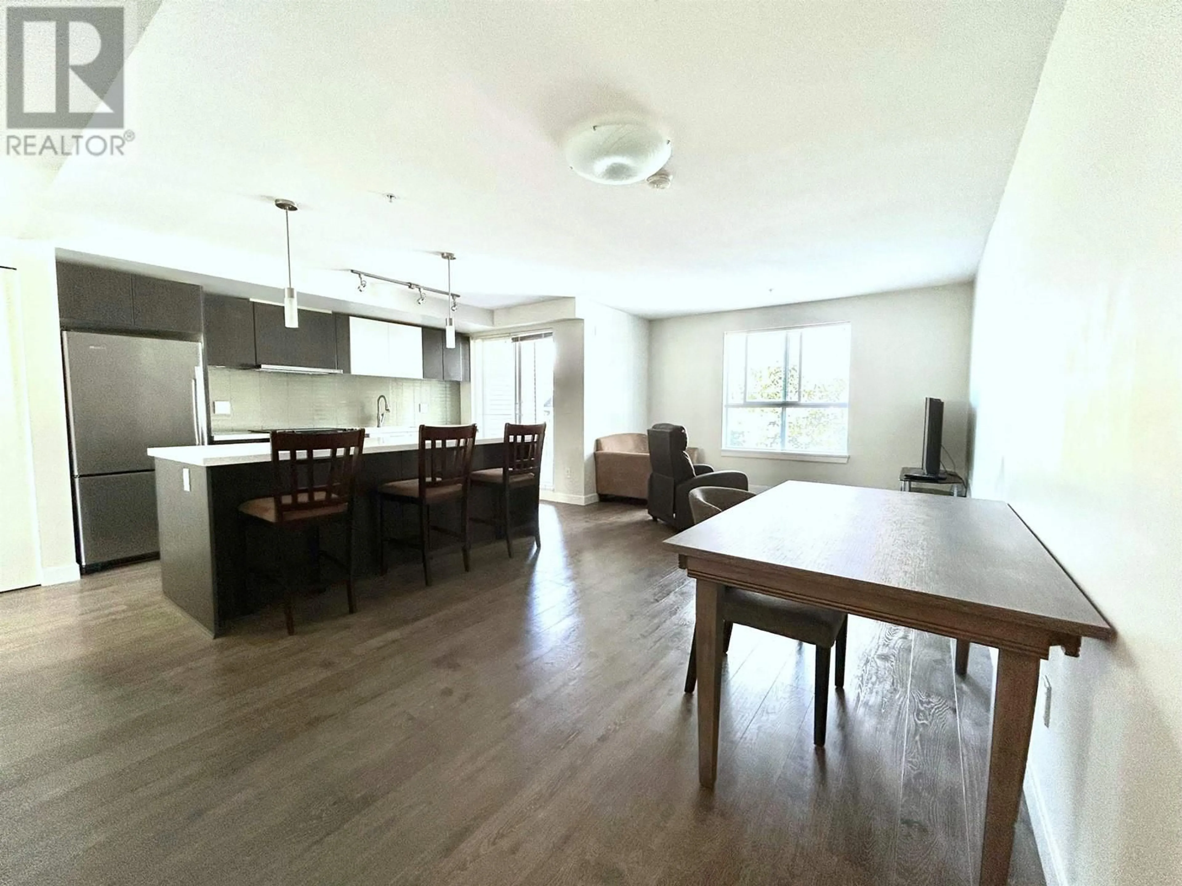 Open concept kitchen, wood/laminate floor for 210 618 LANGSIDE AVENUE, Coquitlam British Columbia V3J0B8