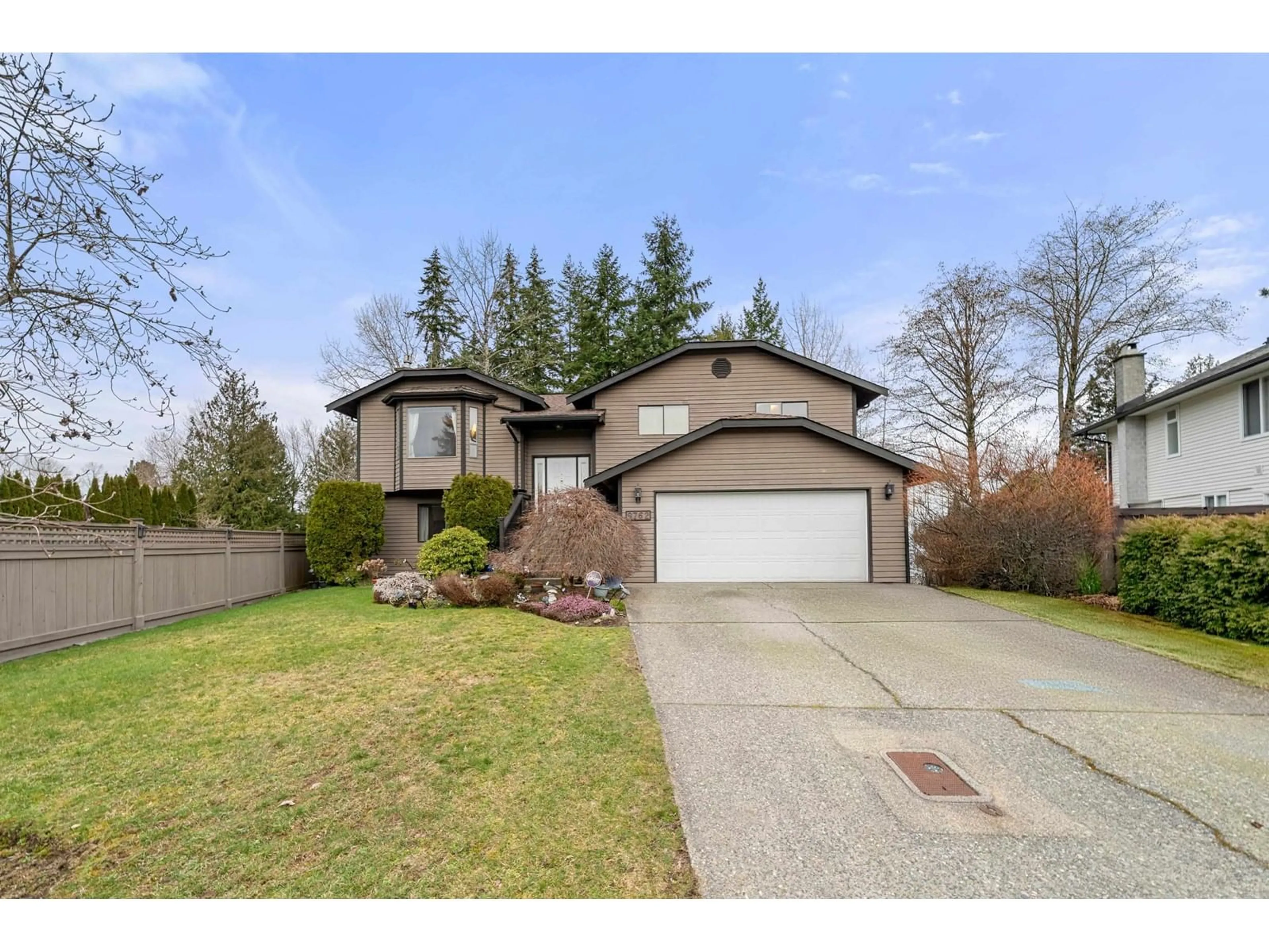 Home with vinyl exterior material, street for 9762 149, Surrey British Columbia V3R8C6