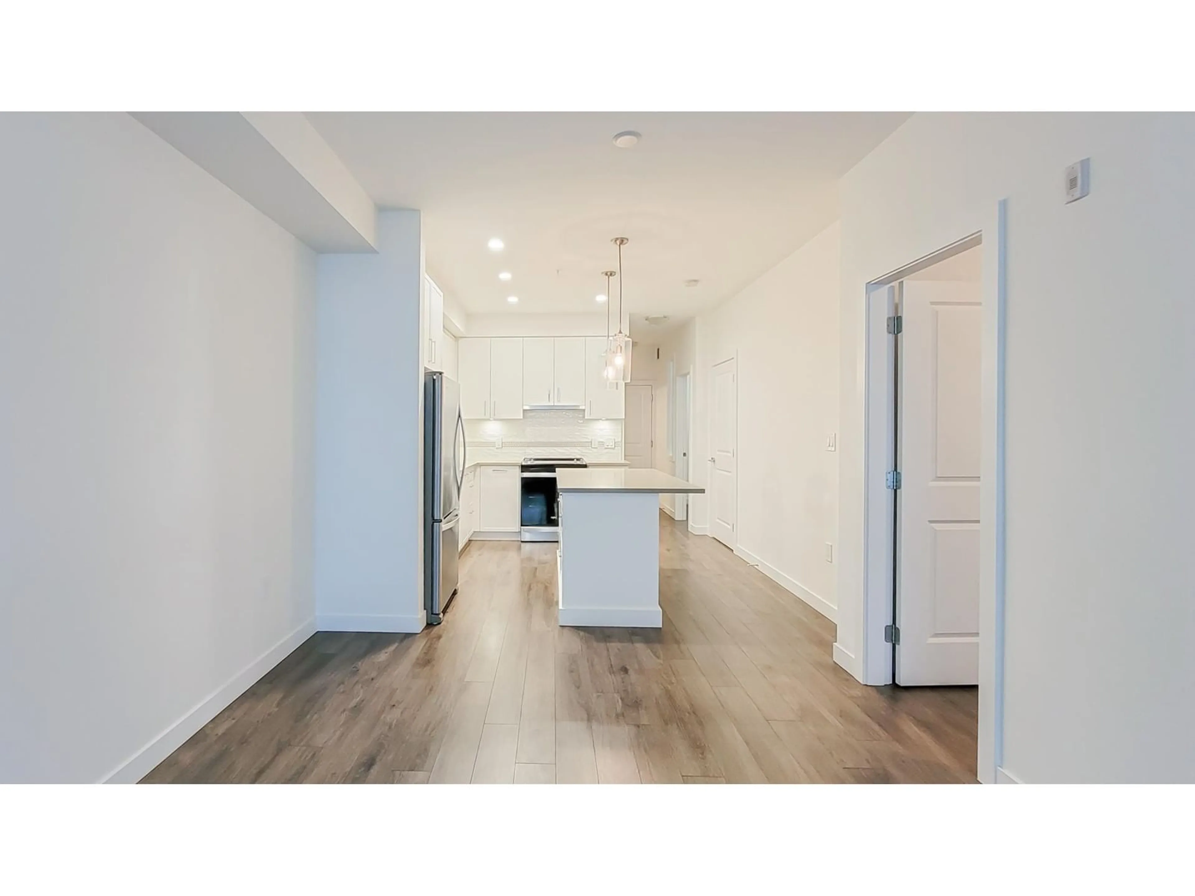 Open concept kitchen, unknown for A305 - 20834 80, Langley British Columbia V2Y3M3