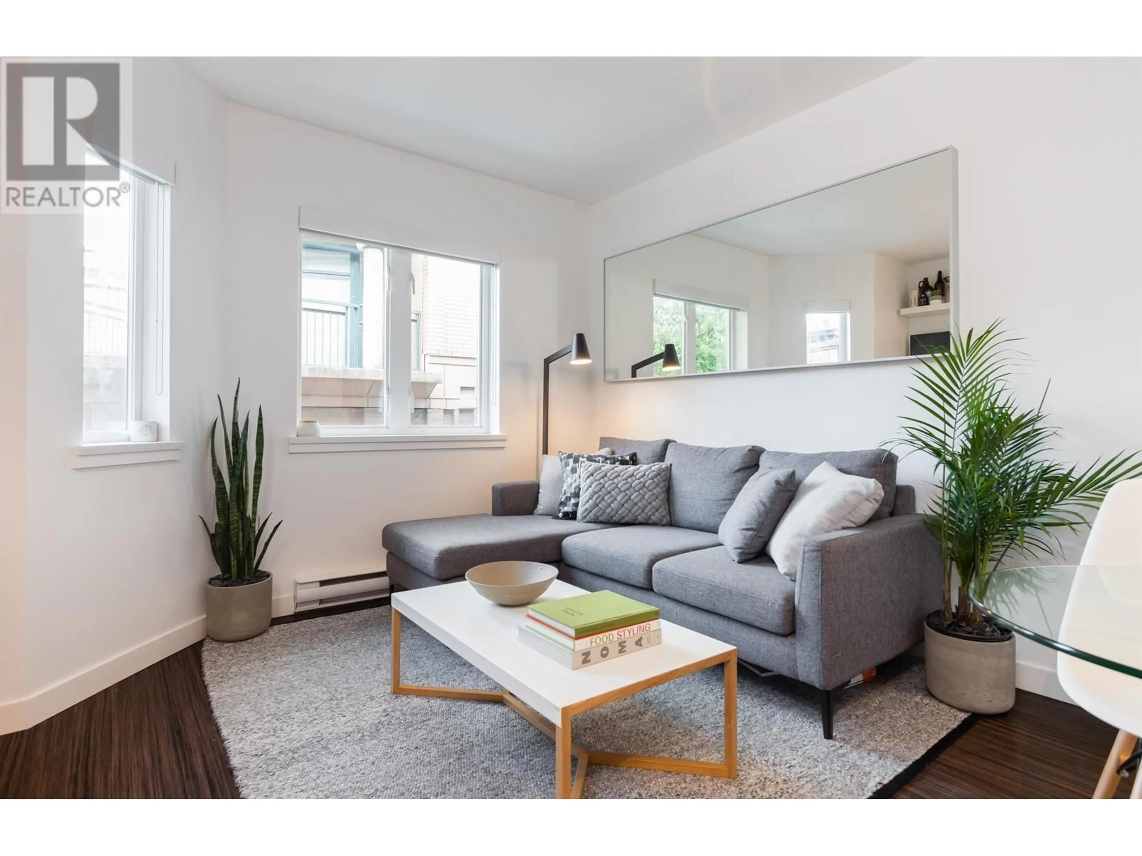 Living room with furniture, wood/laminate floor for 304 370 CARRALL STREET, Vancouver British Columbia V6B2J3