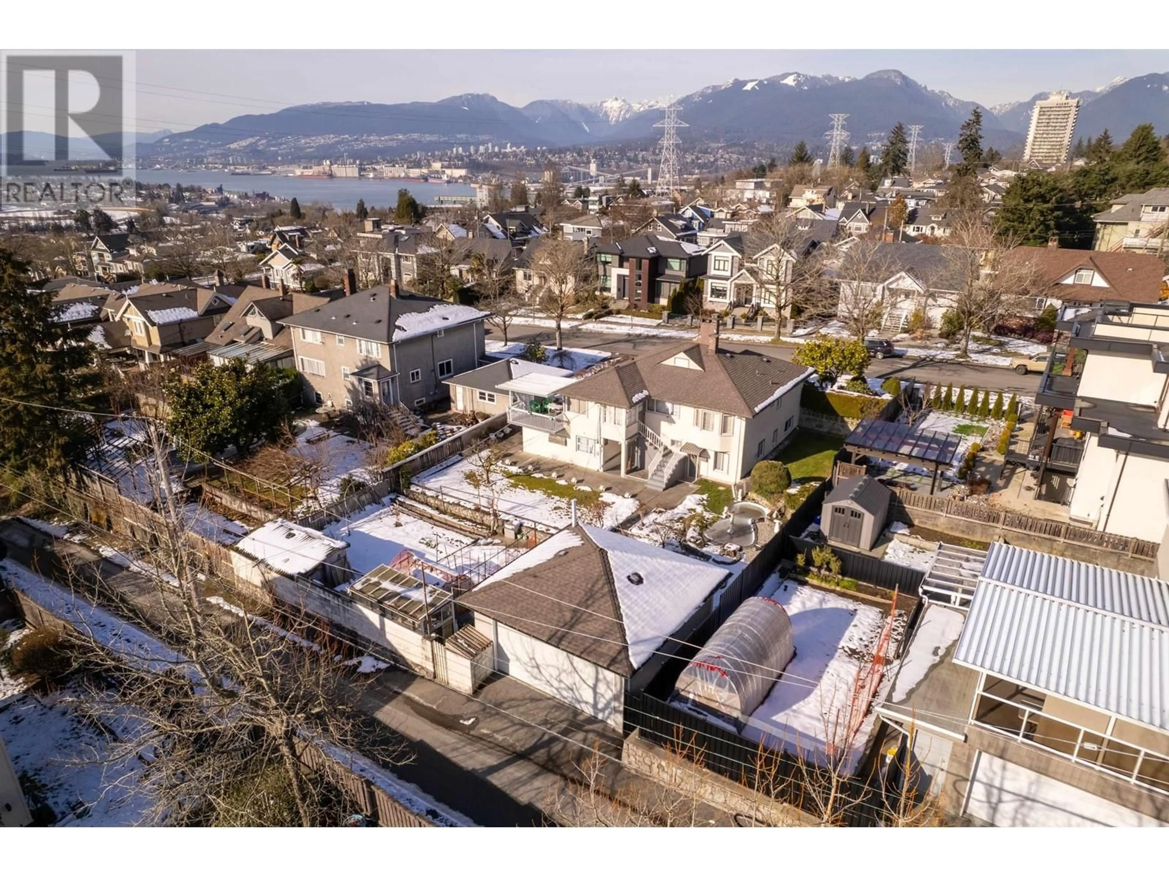 A pic from outside/outdoor area/front of a property/back of a property/a pic from drone, mountain view for 3776 PANDORA STREET, Burnaby British Columbia V5C2A3