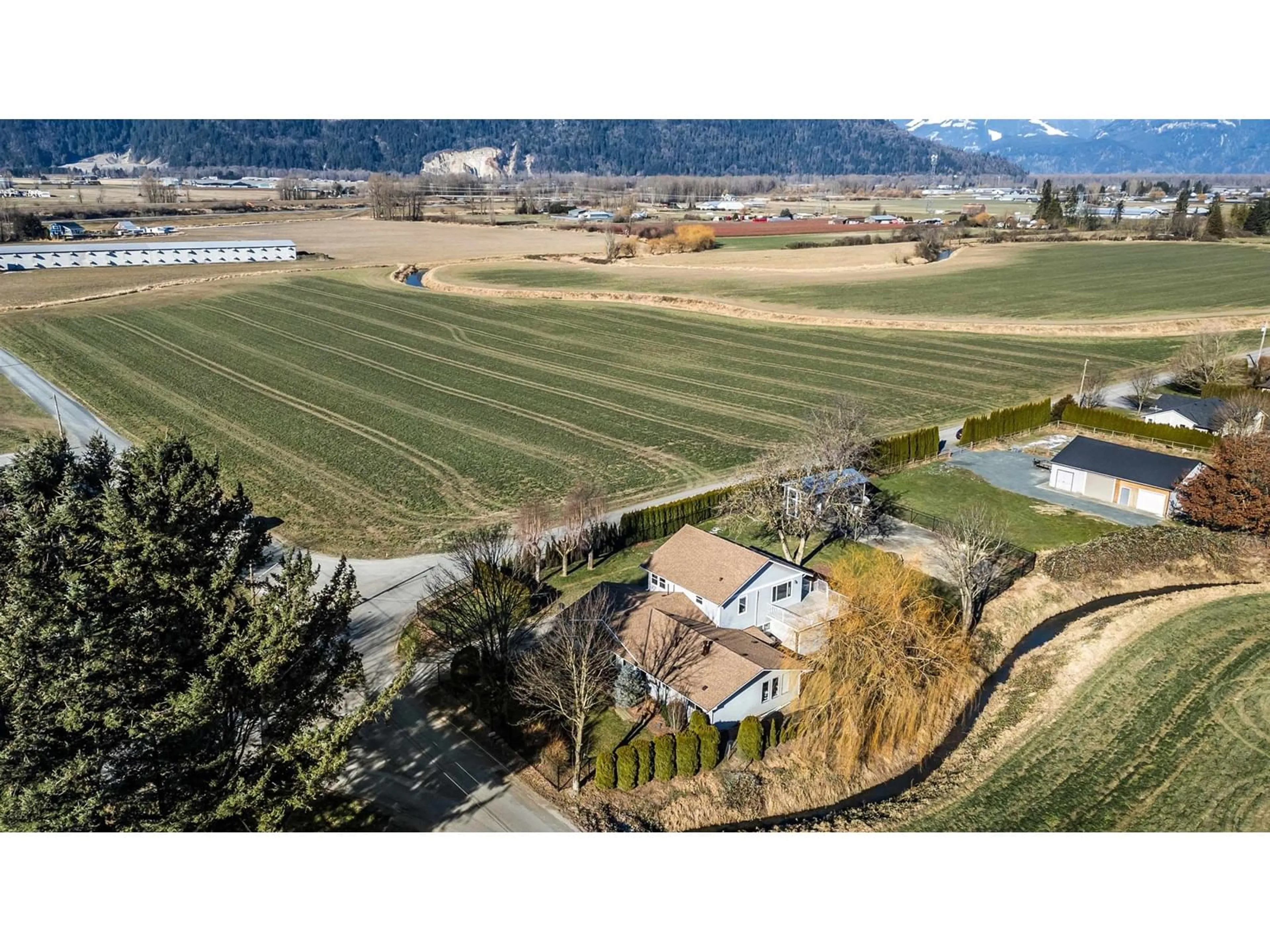 A pic from outside/outdoor area/front of a property/back of a property/a pic from drone, mountain view for 42013 SINCLAIR ROAD, Chilliwack British Columbia V2R4N8