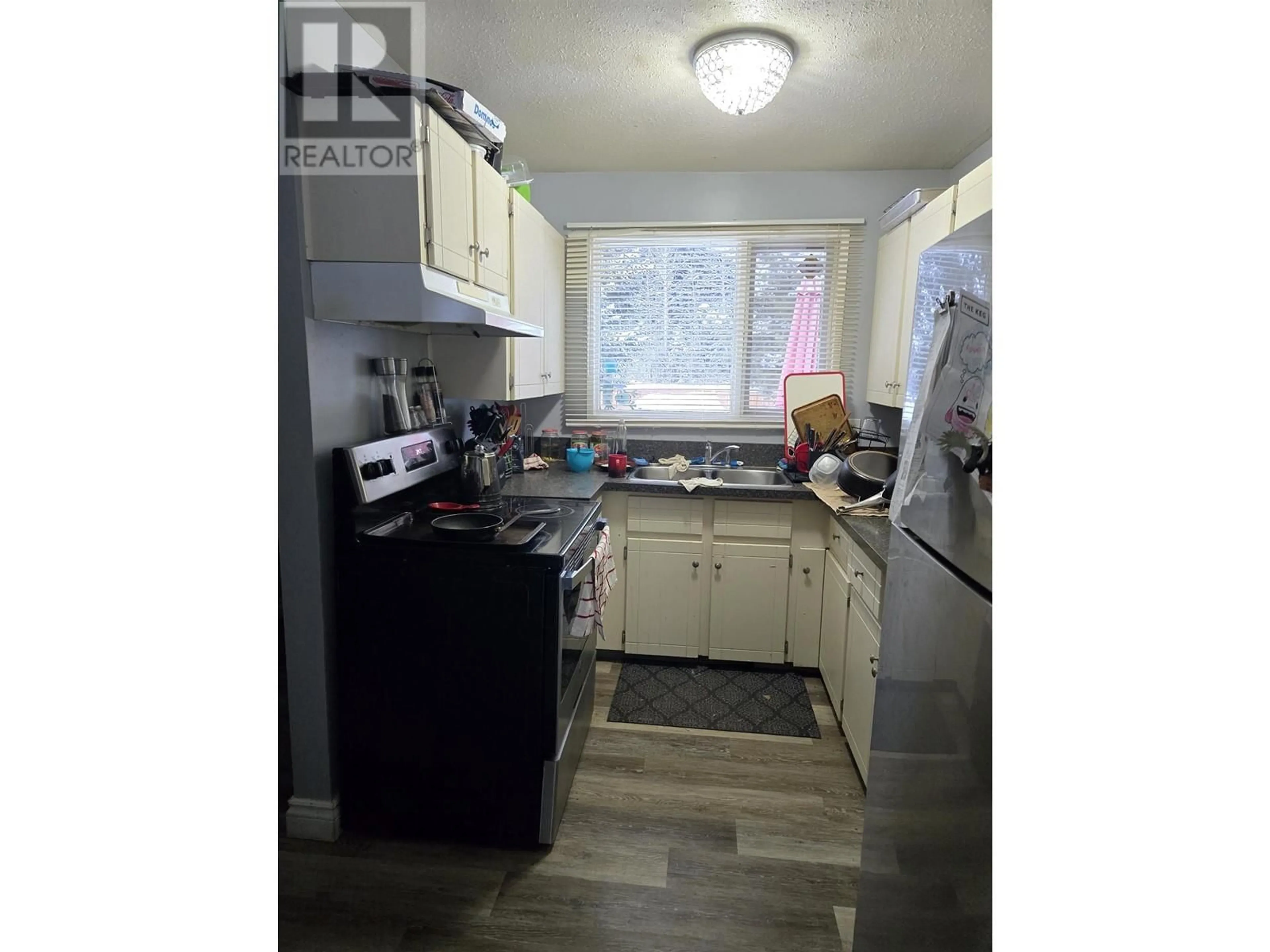 Standard kitchen, wood/laminate floor for 7879 PIEDMONT CRESCENT, Prince George British Columbia V2N3K8