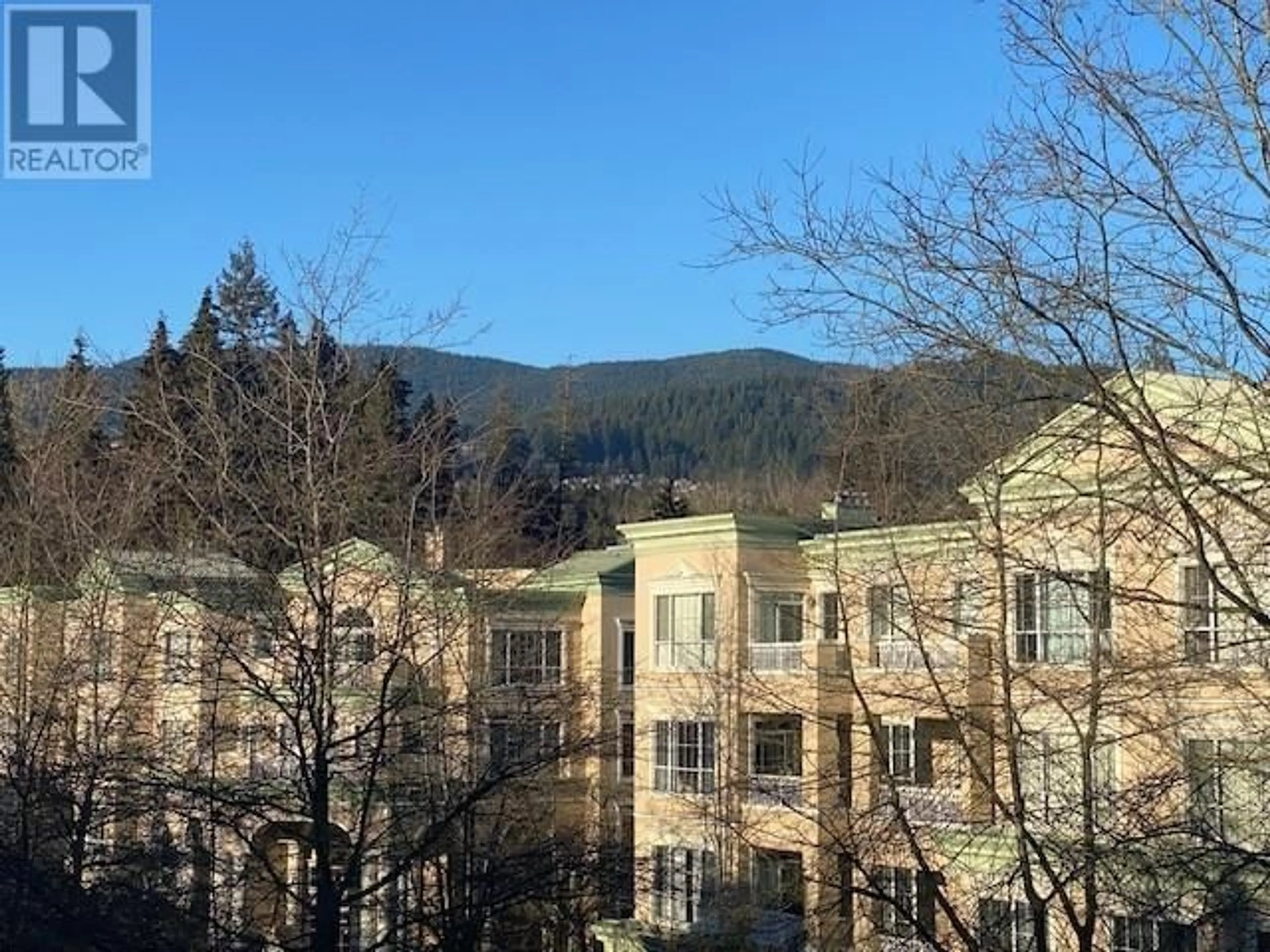 A pic from outside/outdoor area/front of a property/back of a property/a pic from drone, mountain view for 425 2980 PRINCESS CRESCENT, Coquitlam British Columbia V3B7R4