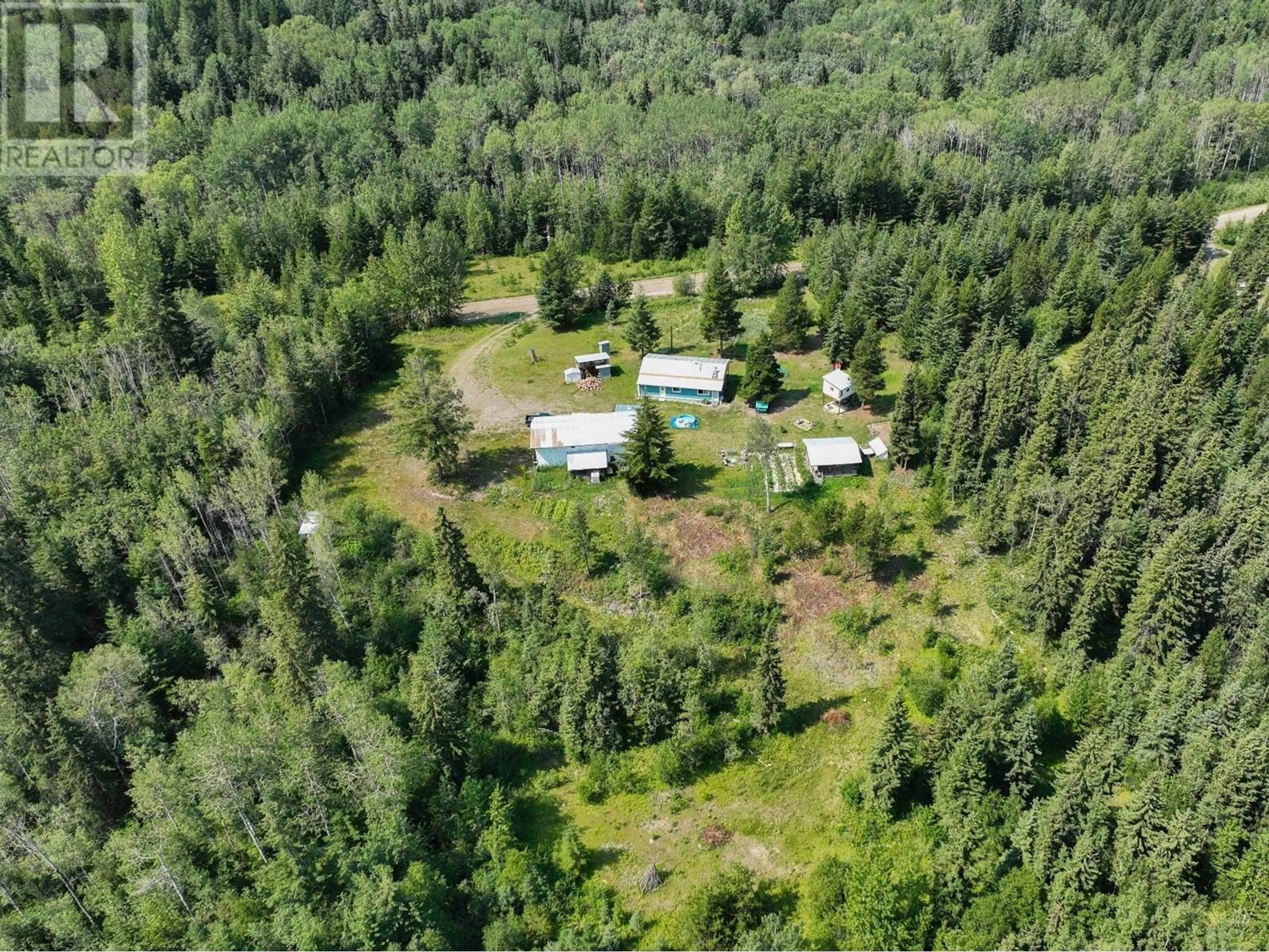 A pic from outside/outdoor area/front of a property/back of a property/a pic from drone, forest/trees view for 1240 PALEY ROAD, Quesnel British Columbia V2J7G1