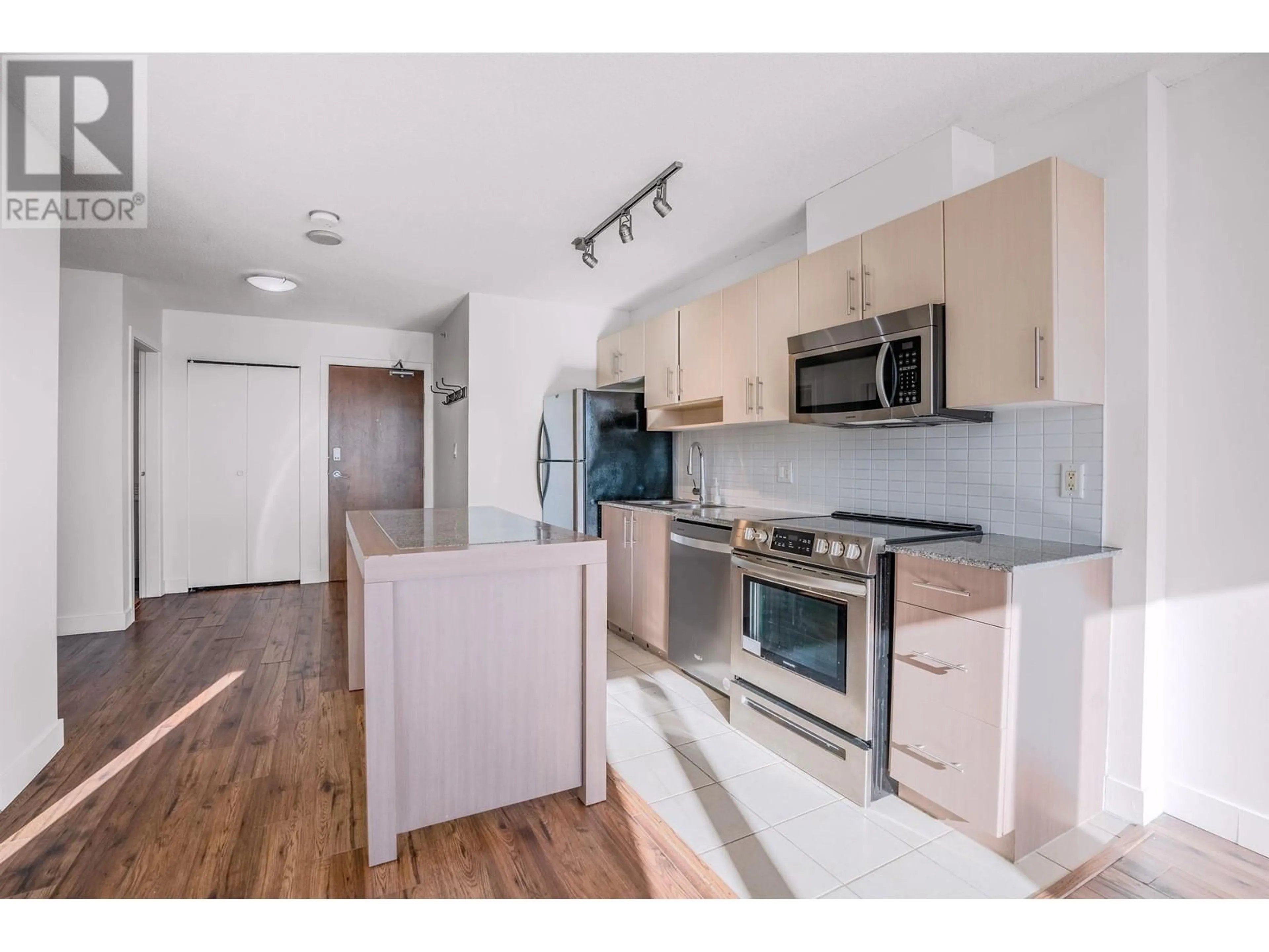 Open concept kitchen, wood/laminate floor for 1810 550 TAYLOR STREET, Vancouver British Columbia V6B1R1