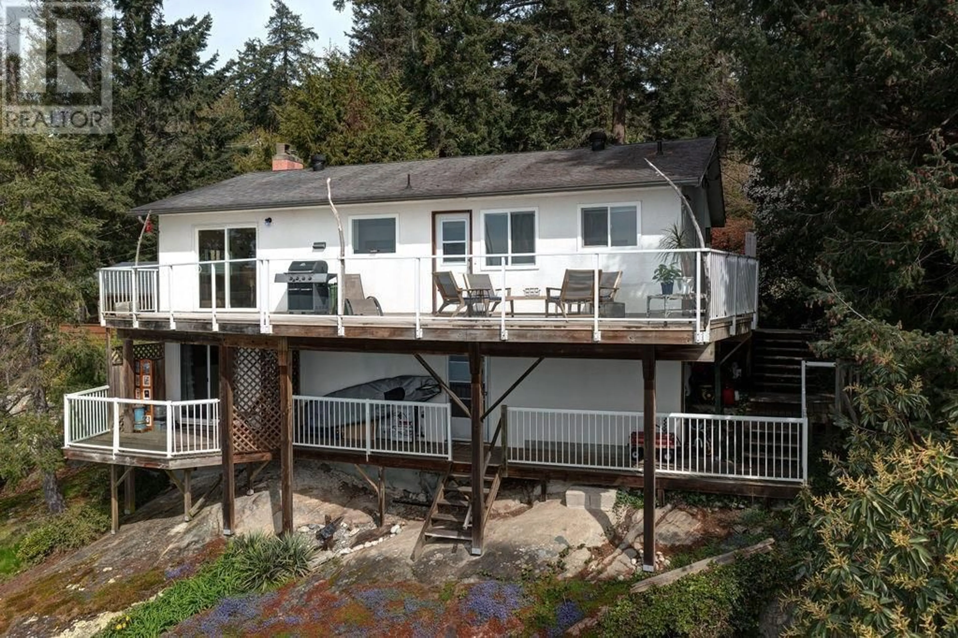 A pic from outside/outdoor area/front of a property/back of a property/a pic from drone, water/lake/river/ocean view for 8323 REDROOFFS ROAD, Halfmoon Bay British Columbia V7Z1E4