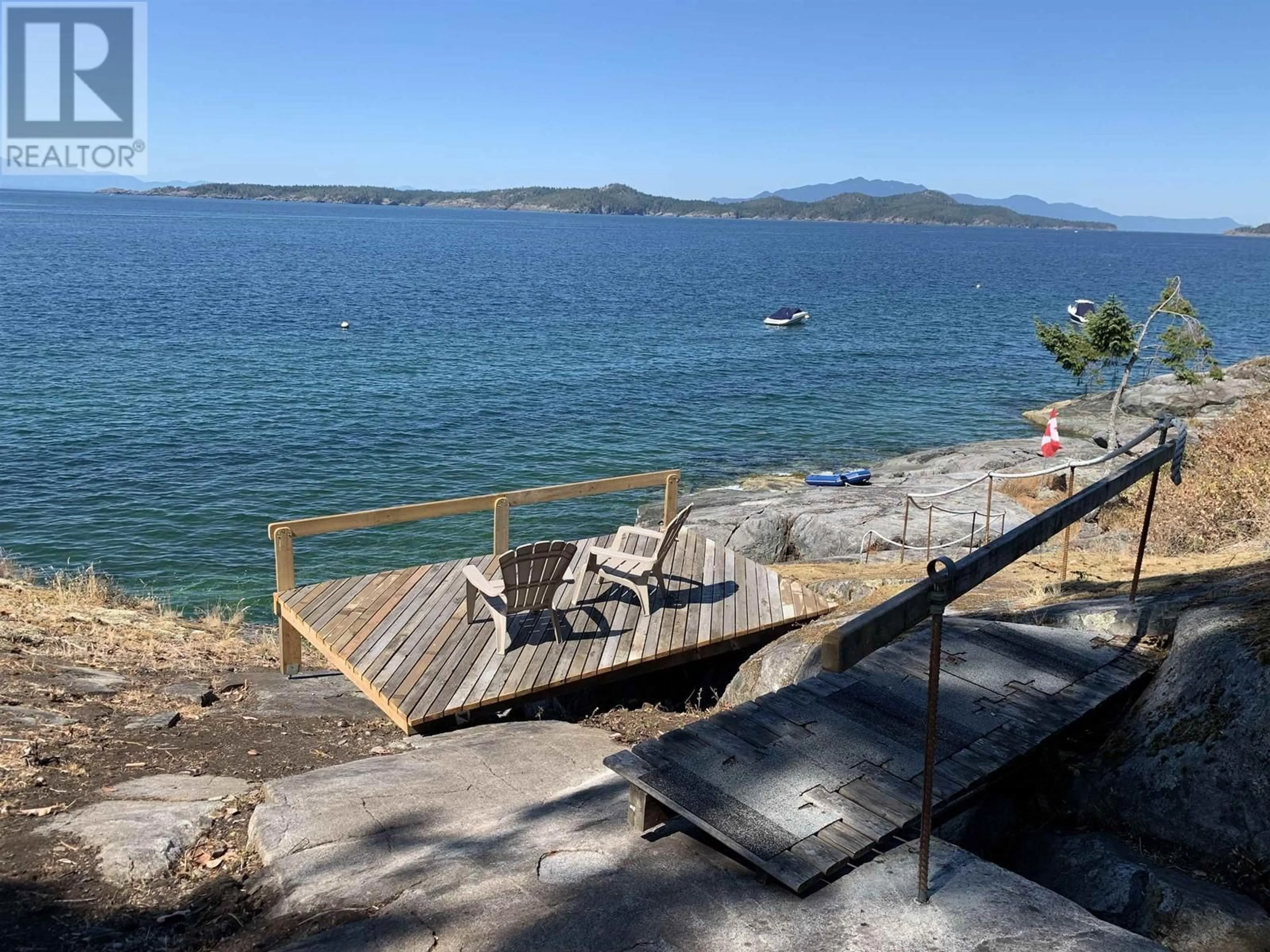 Patio, water/lake/river/ocean view for 8323 REDROOFFS ROAD, Halfmoon Bay British Columbia V7Z1E4