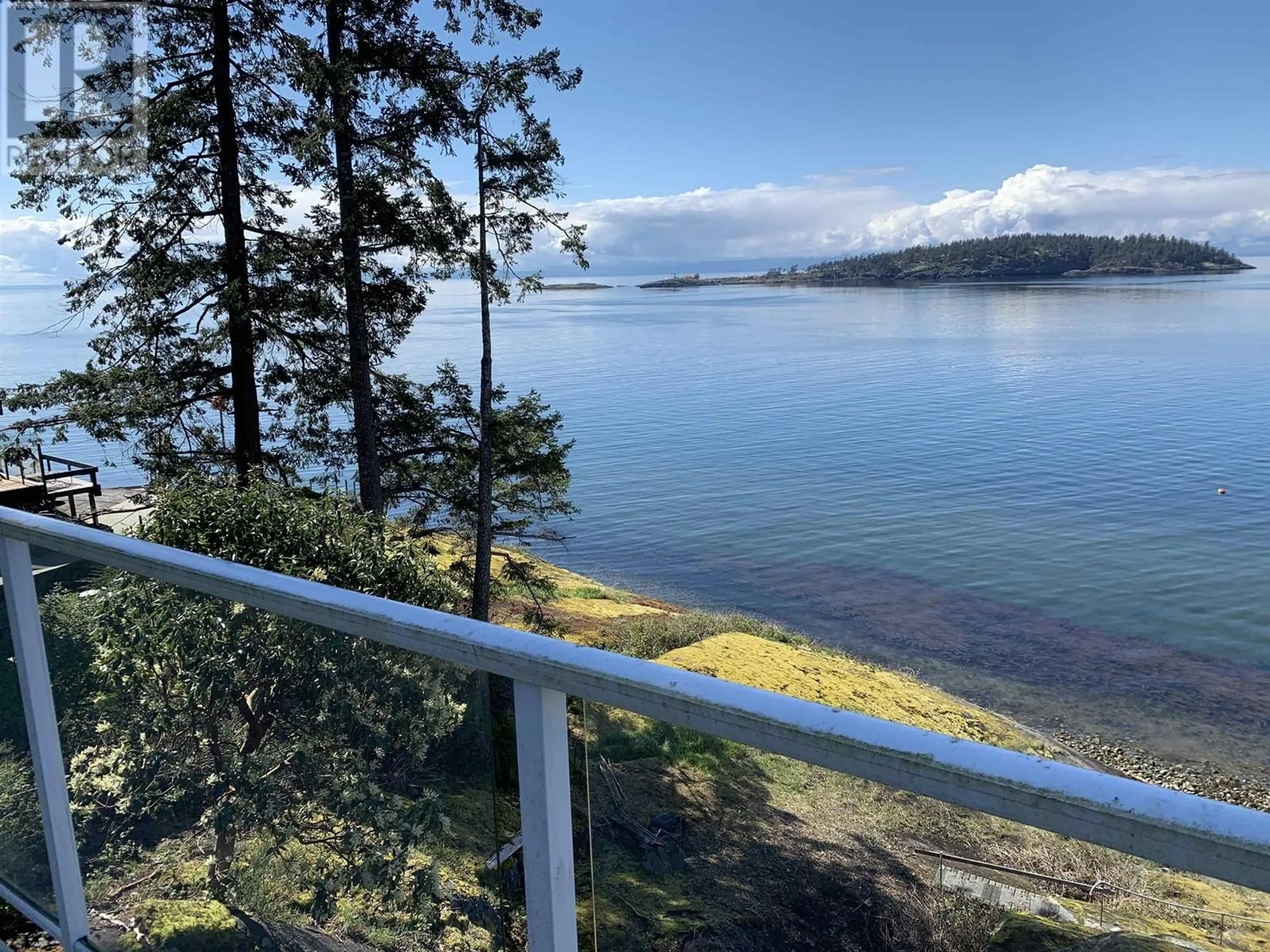 A pic from outside/outdoor area/front of a property/back of a property/a pic from drone, water/lake/river/ocean view for 8323 REDROOFFS ROAD, Halfmoon Bay British Columbia V7Z1E4