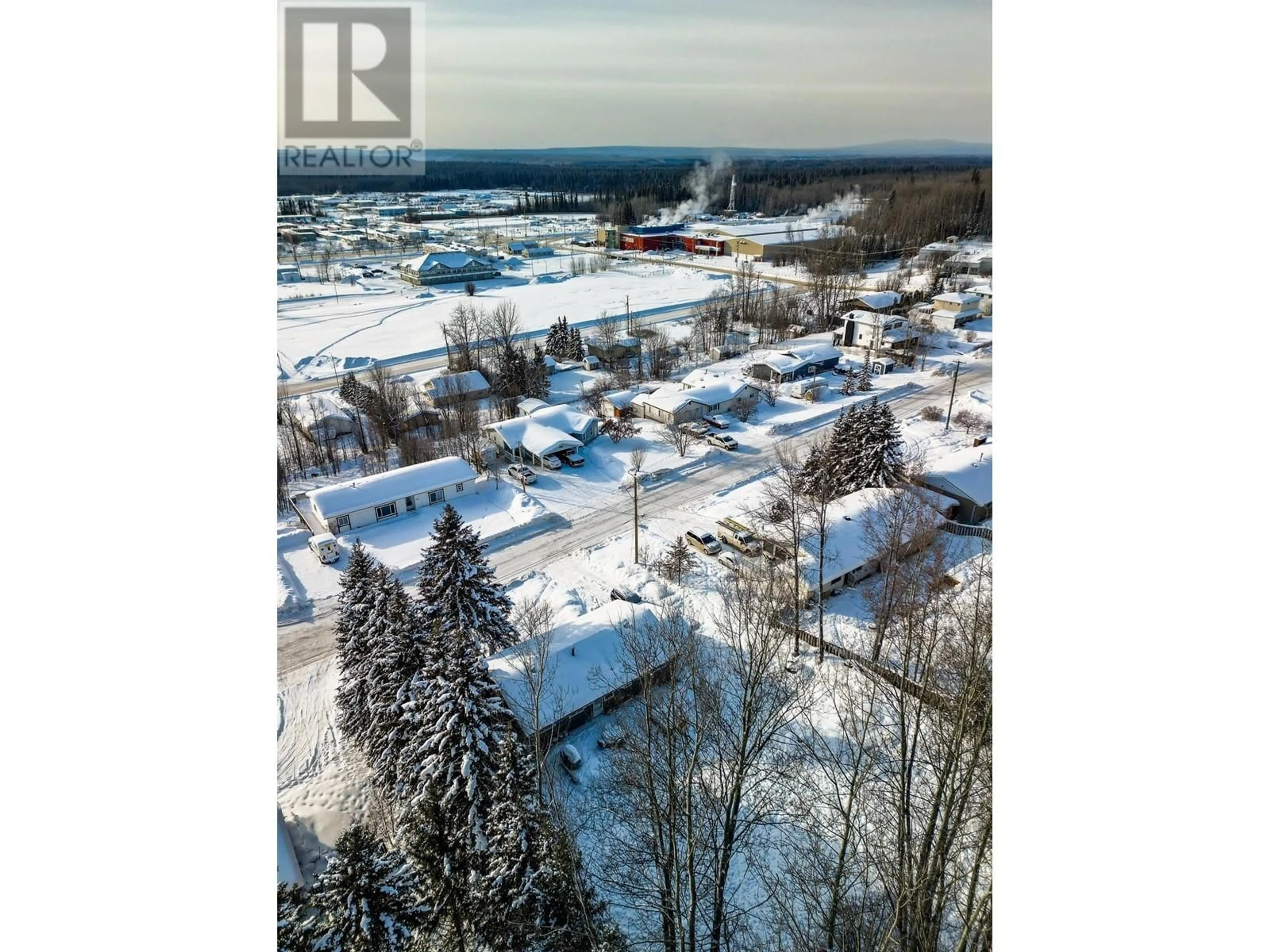 A pic from outside/outdoor area/front of a property/back of a property/a pic from drone, street for 5324 W 53 AVENUE, Fort Nelson British Columbia V0C1R0