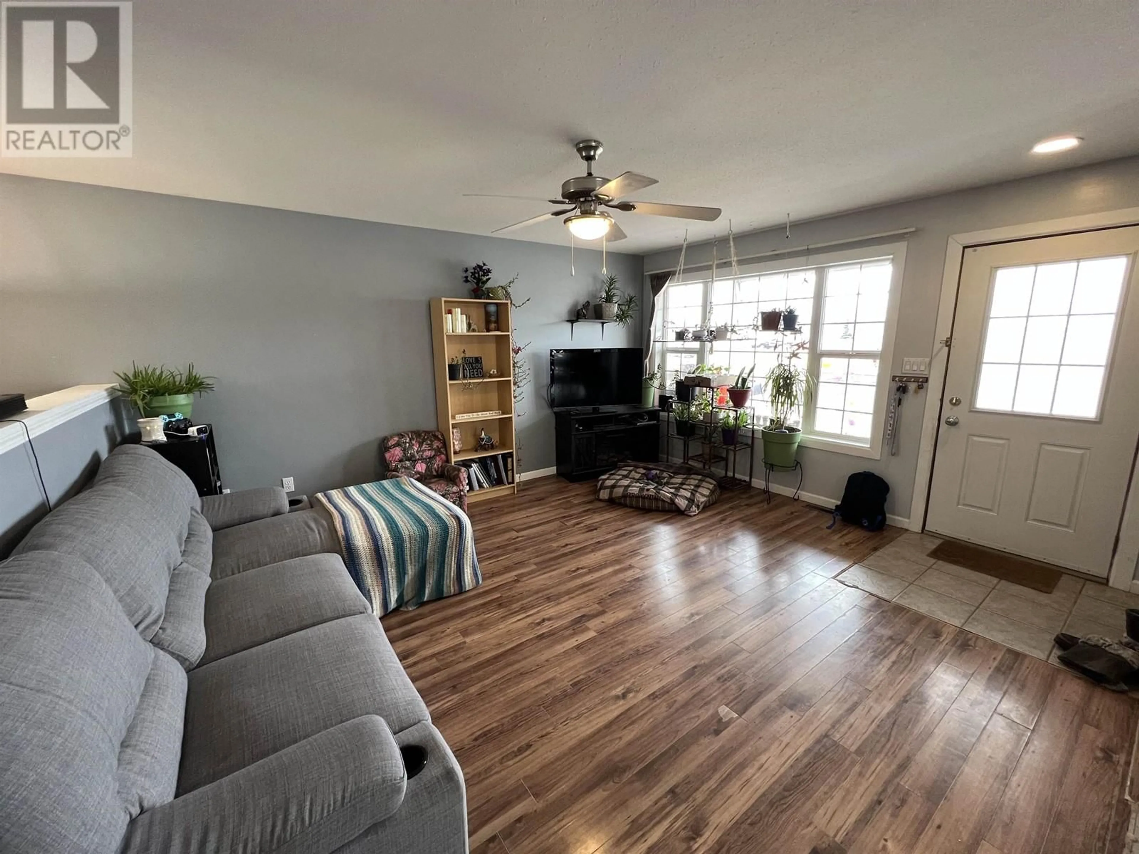 Living room with furniture, unknown for 5012 46 STREET, Fort Nelson British Columbia V0C1R0